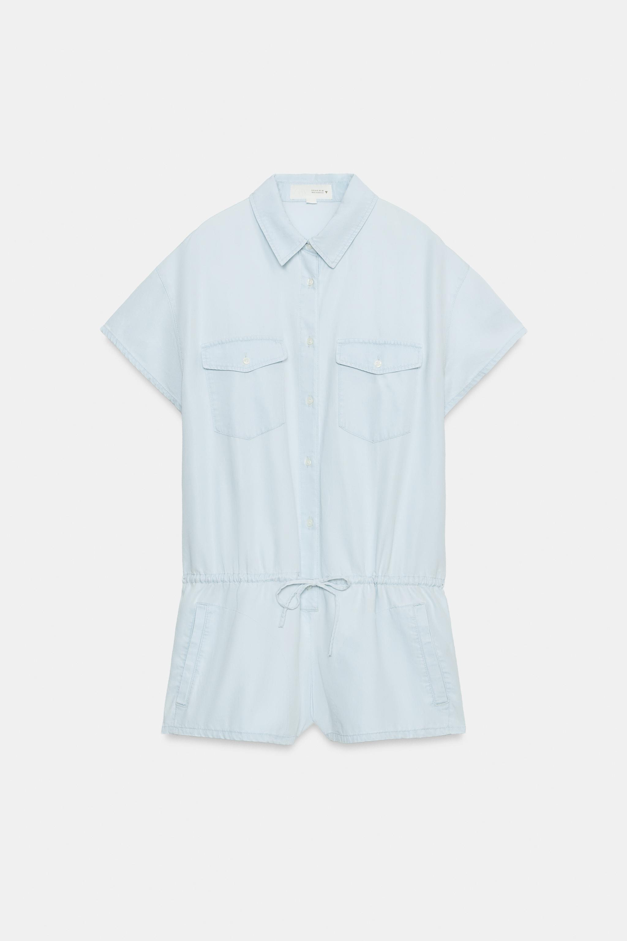 Short jumpsuit made from 65% lyocell blend yarn. Lapel collar and short sleeves. Adjustable draws... | Zara US