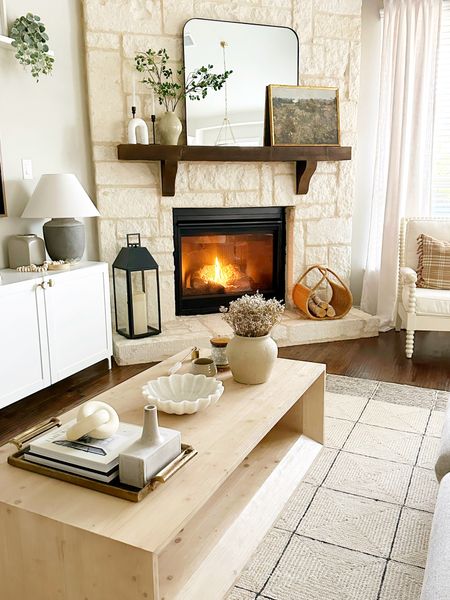 Living room // coffee table styling // neutral decor and mantel mirror

#LTKhome #LTKFind #LTKstyletip