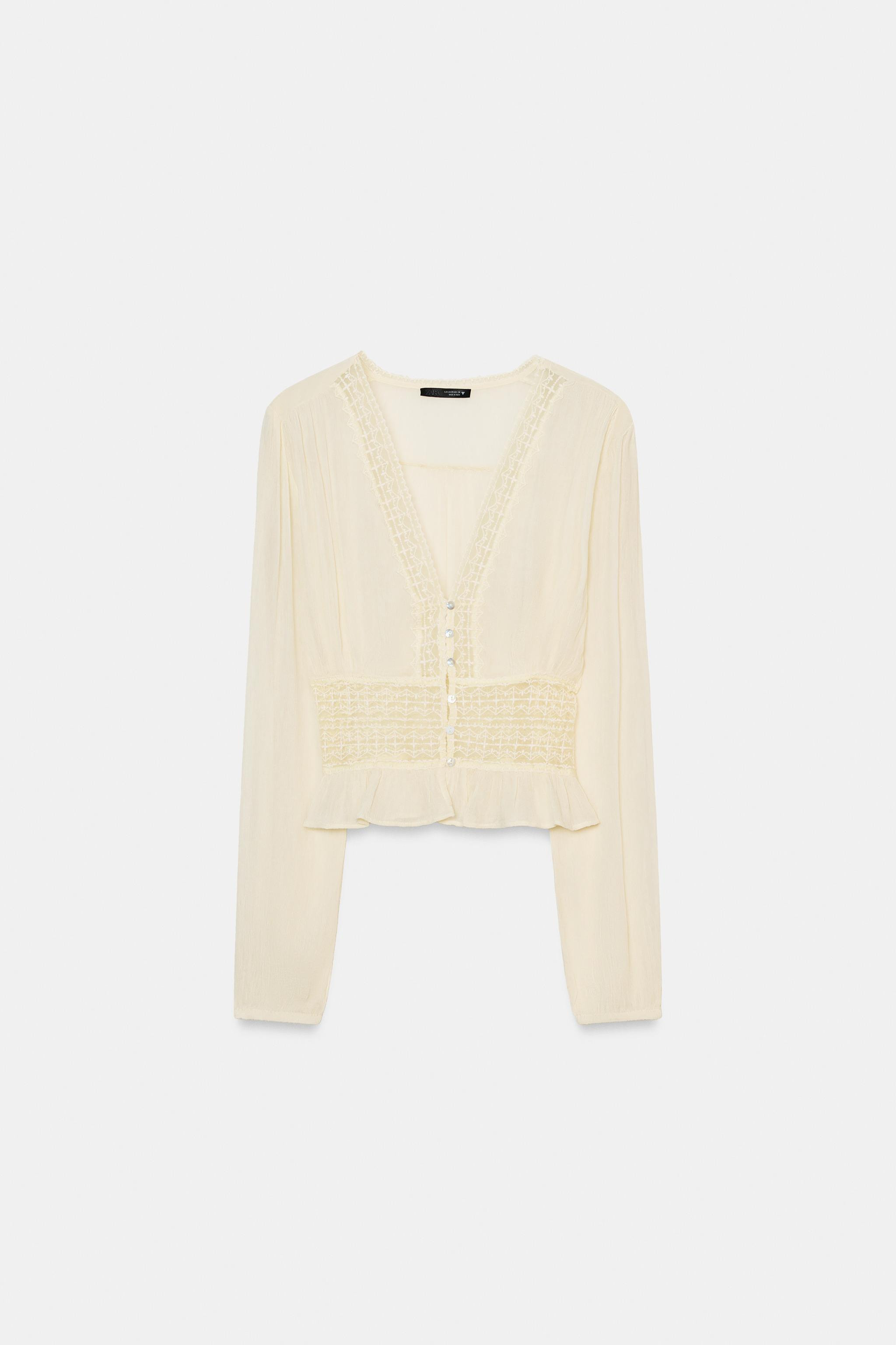 Semi-sheer V-neck shirt with long sleeves and elasticized cuffs. Matching tonal lace detail. Fron... | Zara US