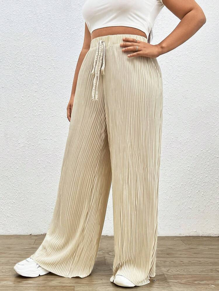 SHEIN EZwear Plus Tie Waist Plisse Wide Leg Pants
       
              
              $17.49  
 ... | SHEIN