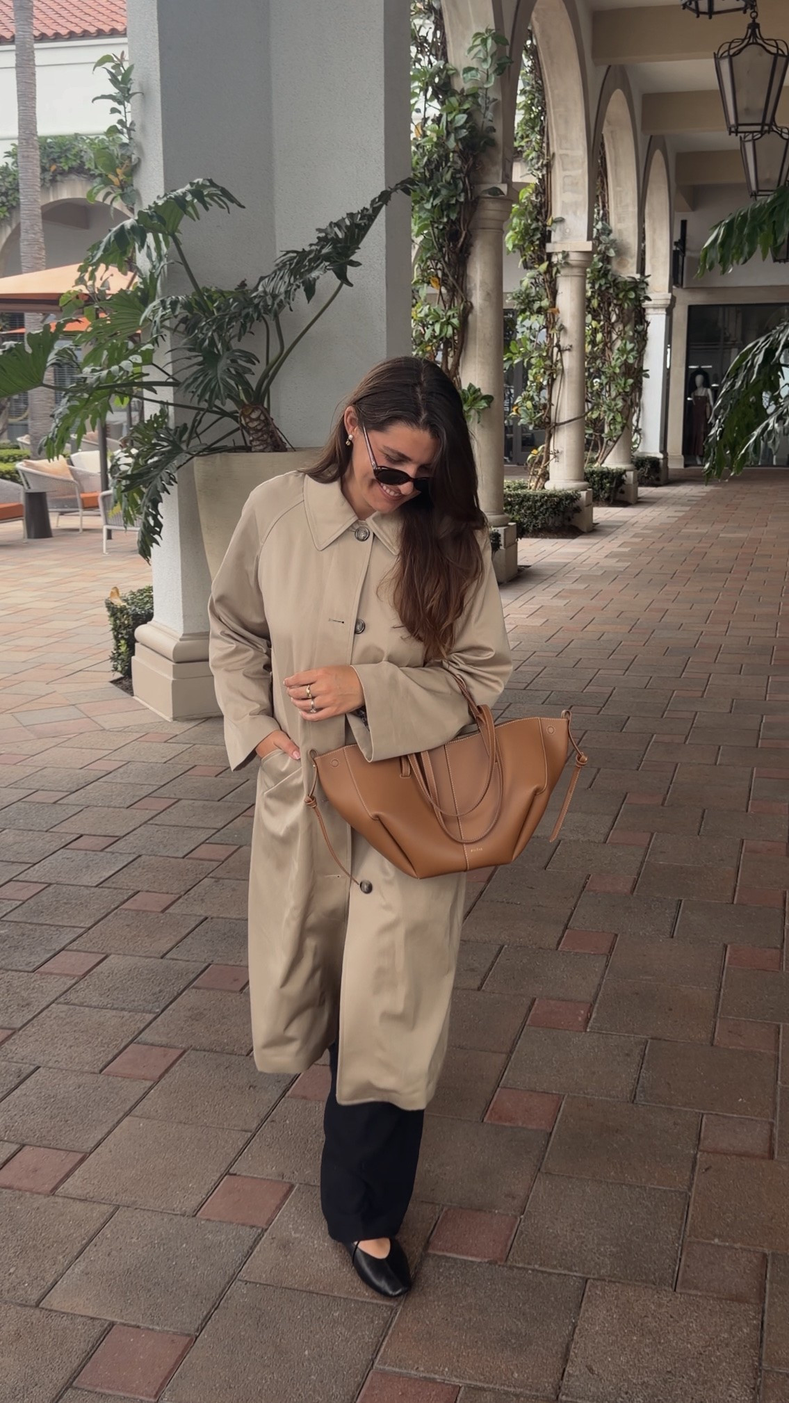 Styling my Polène Cyme Mini 🤎

Outfit Details:
Trench coat: @SEZANE 
Pants: @Aritzia 
Flats: @mgemi 
Tote: Polène, linked similar options here

#LTKSeasonal #LTKTravel #LTKgrwm