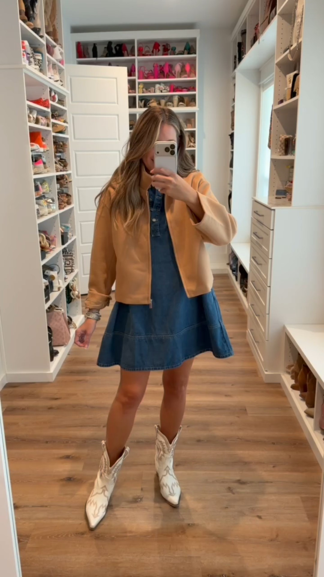 In a medium cropped bomber jacket, small denim dress, boots and accessories - fits tts.

#LTKStyleTip #LTKSeasonal #LTKFindsUnder50