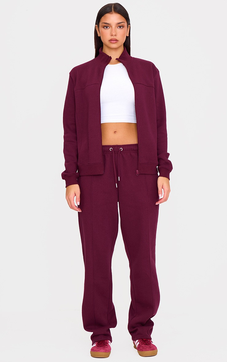 Burgundy Seam Detail Zip Through High Neck Sweatshirt | PrettyLittleThing IE