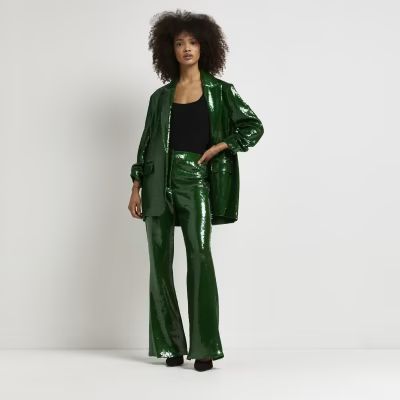 Green sequin flared trousers | River Island (UK & IE)