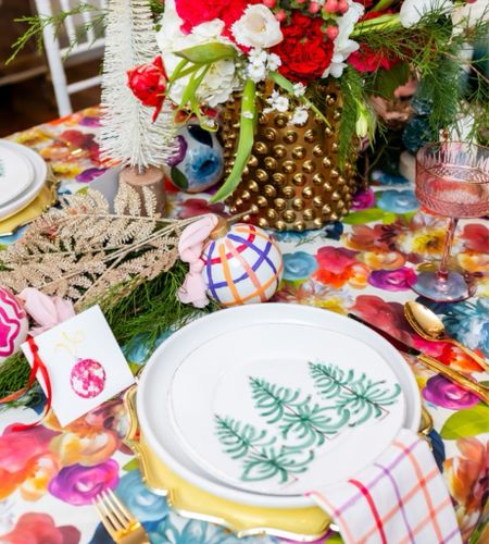 Detailed shots of my tablescape this holiday season just so you can see up close how stunning these bright details are. 🎄⚡️💖

- Bottle Brush Trees
- Colorful Coupe Glasses
- Christmas Tree Plates
- Acrylic Silverware
- Gold Chargers
- Garland and Greenery
- Colorful Glassware 

#LTKHoliday #LTKfindsunder50 #LTKSeasonal