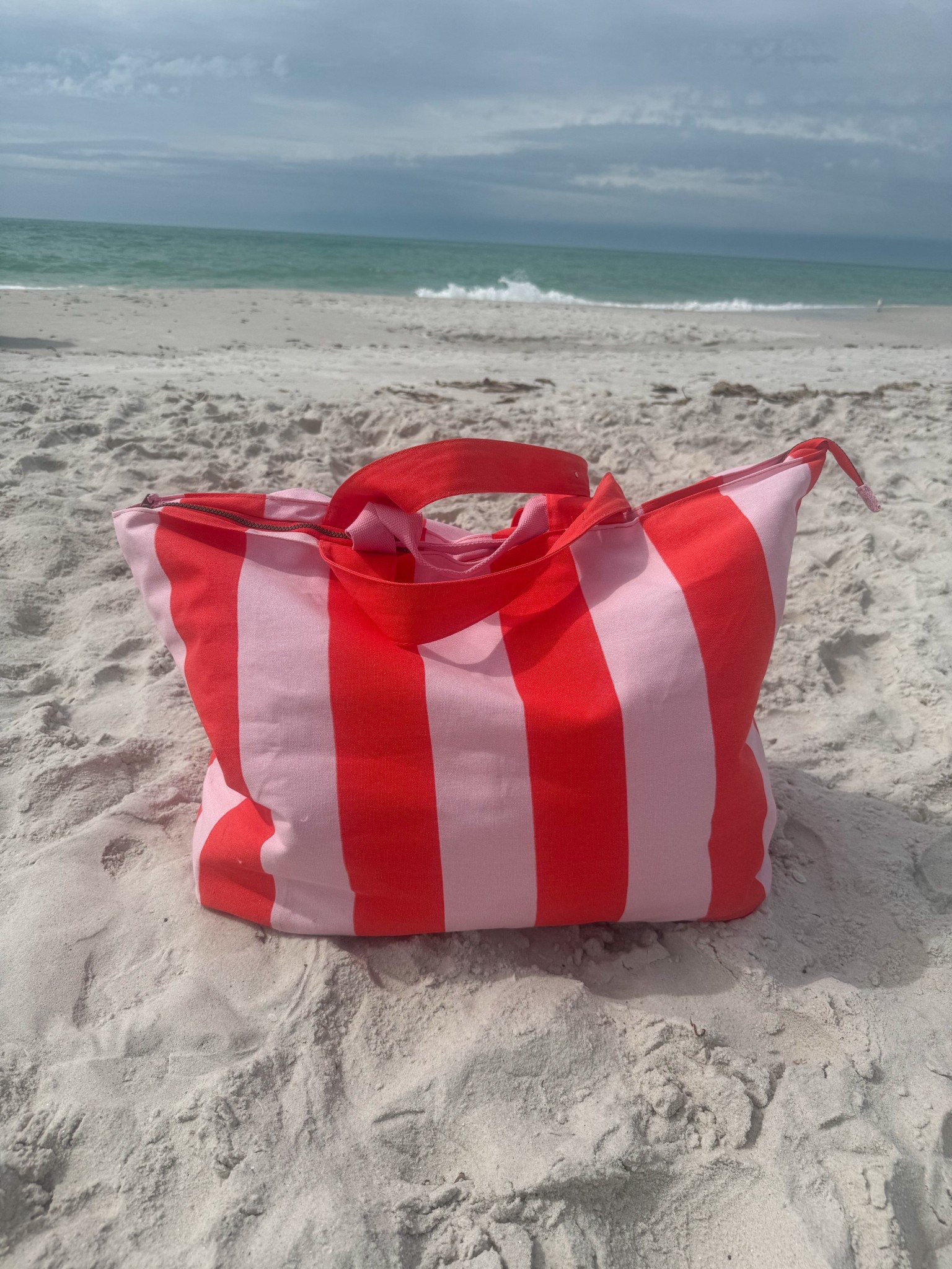 absolutely LOVE this beach bag. It comes in so many colors and it is HUGE!!! Carries so so much! Highly recommend. 

#LTKTravel #LTKmomlife #LTKSwim