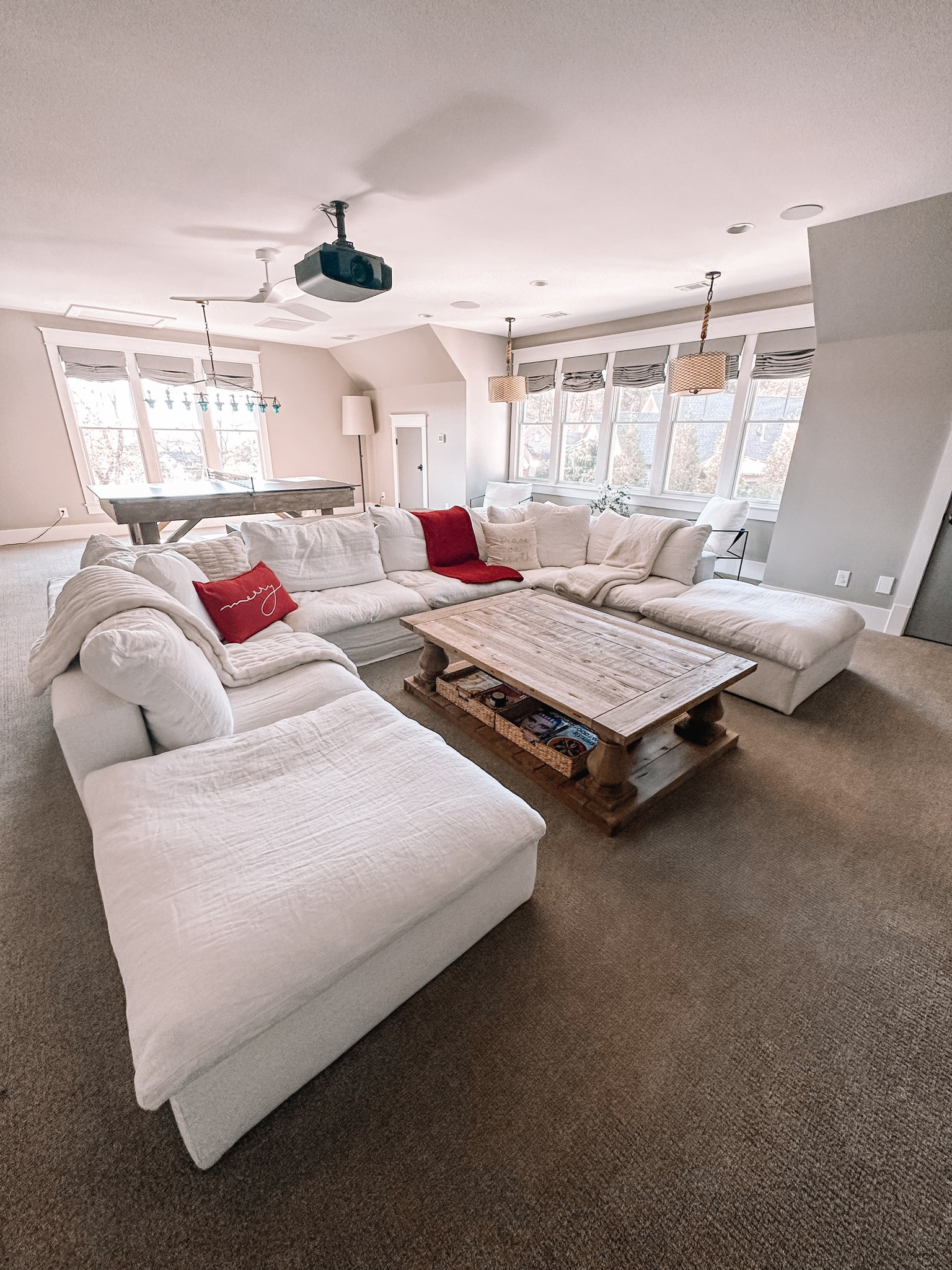 Media room with a little Christmas decor. Restoration Hardware cloud sofa in white Belgian linen, linked several dupes. Pottery Barn Christmas throw pillows and blankets  

#LTKHoliday #LTKSeasonal #LTKhome