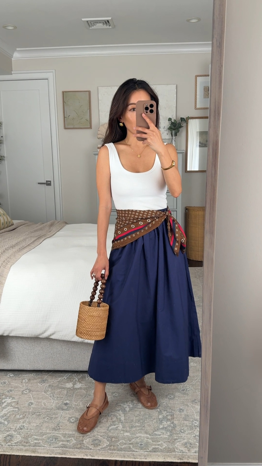 Aritzia sale + Example look from my summer travel capsule: • cotton skirt 2XS high quality, lined, pockets. Poplin fabric shows only minimal wrinkles. Size down if between sizes since the elastic waist is slightly loose
• built in bra tank top XS
• Madewell medium silk scarf love this one
• mesh flats sz 6 with insole inserts
• jcrew wicker bag

Navy skirt and white, summer capsule wardrobe, europe italy trip outfit ideas, petite summer vacation style

#LTKPetite #LTKTravel #LTKootd