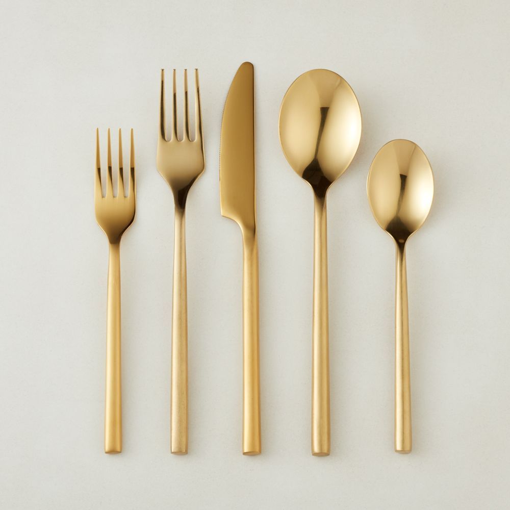 20-piece rush gold flatware set | CB2