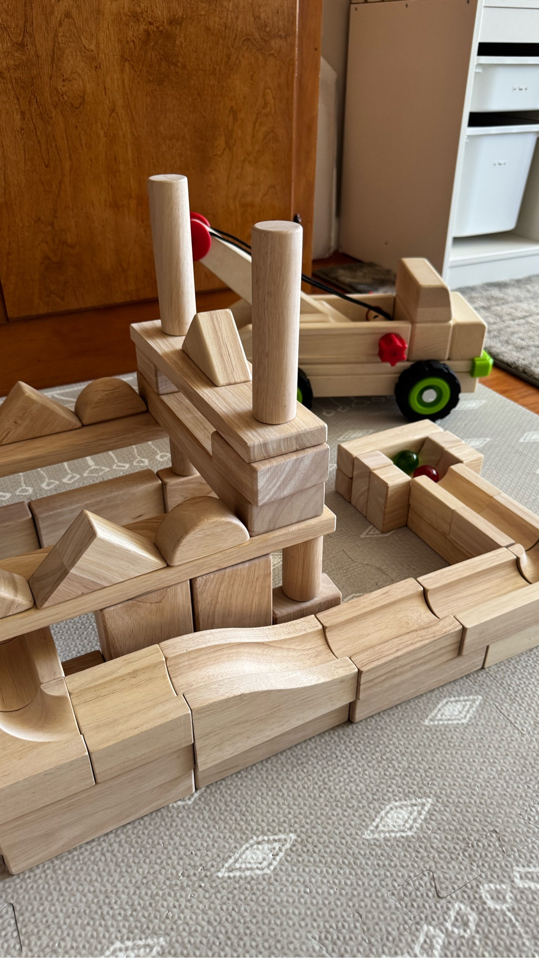 When Daddy builds, imaginations run wild 🛠️✨ These @guidecraft_official unit blocks are more than toys—they’re memory makers. 
Bonus? Add the marble run and watch the creativity roll.
•
•
•
 #DadBuilt #MakingMemories #BlockPlay #MarbleRunMagic #guidecraft #boymom #openendedplay #gifted #unitblocks #marblerun #castlebuild #woodentoys #guidecraft_official #imaginativeplay #towtruck