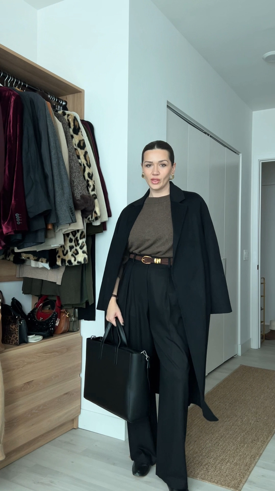 Black and brown is one of those fool proof color combinations that will work time and time again 🤌🏻🎞️💻

Everything I’m wearing is true to size 🤍

•Trousers 6 
•Shoes 8.5 
•Top large for looser fit 
•Duster medium 

#LTKShoeCrush #LTKWatchNow #LTKWorkwear