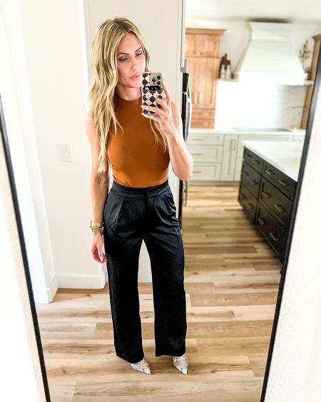 These satin pants are a dream! They fit TTS and come in long length if you’re tall. 🙌🏼 For reference, I’m 5’8”, 145 lbs and I’m wearing a 28 long. 

The bodysuits is from SHEIN, so size up! I’m wearing a large  

#LTKunder100 #LTKworkwear #LTKstyletip