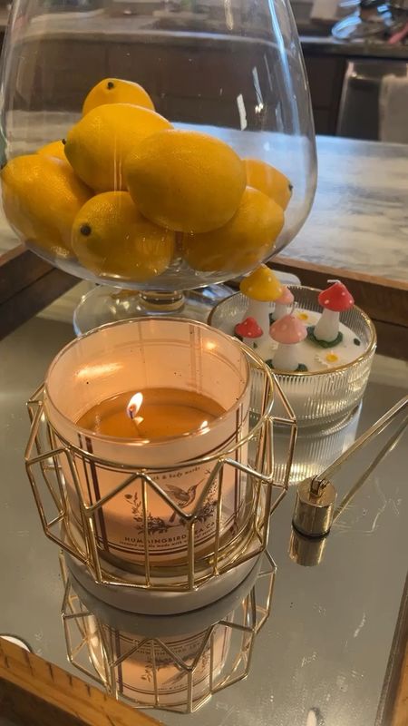 Gold candle holder and Hummingbird Tea Cake Candle 