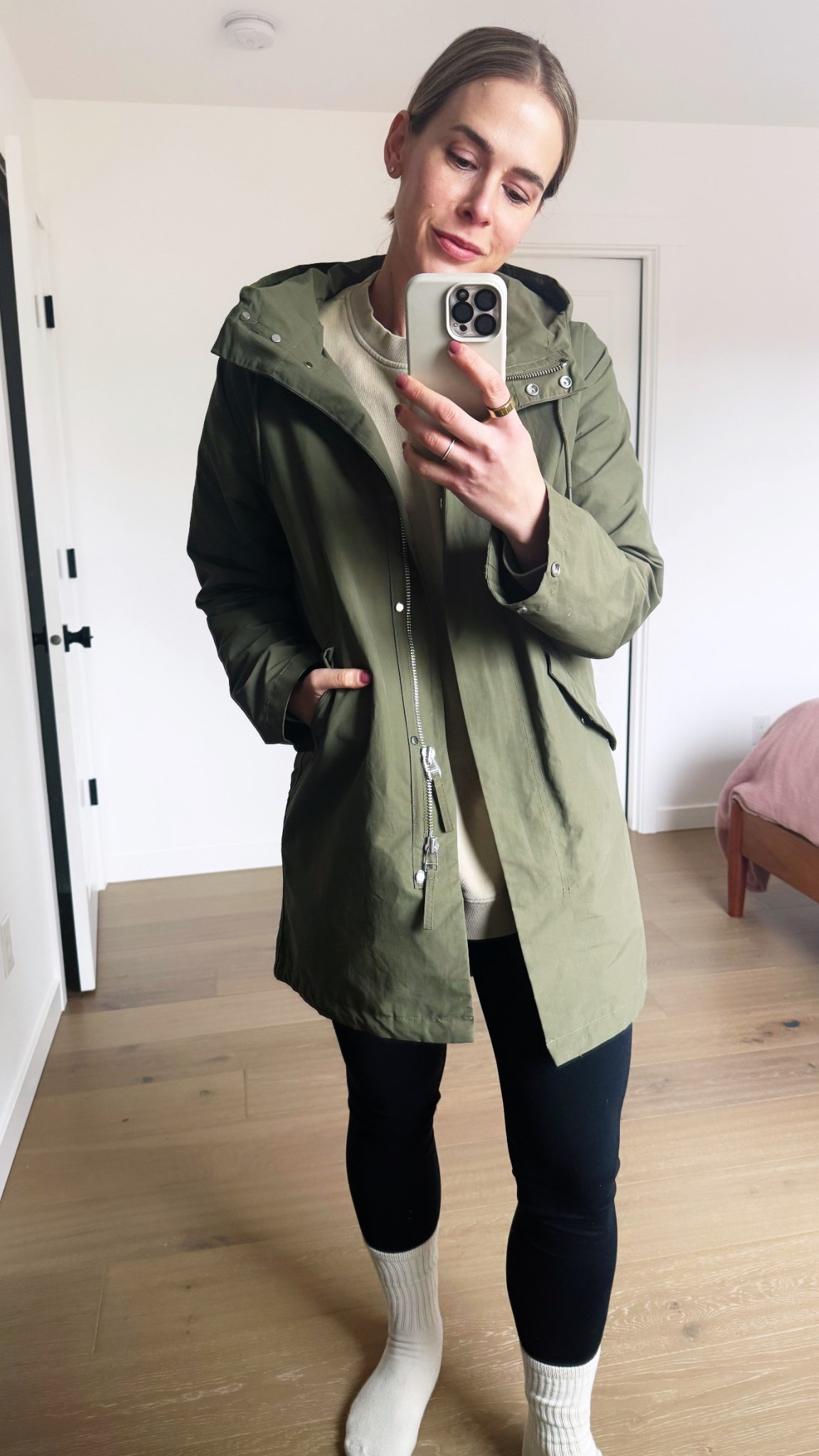 The perfect sustainable rain coat. Wearing size small.