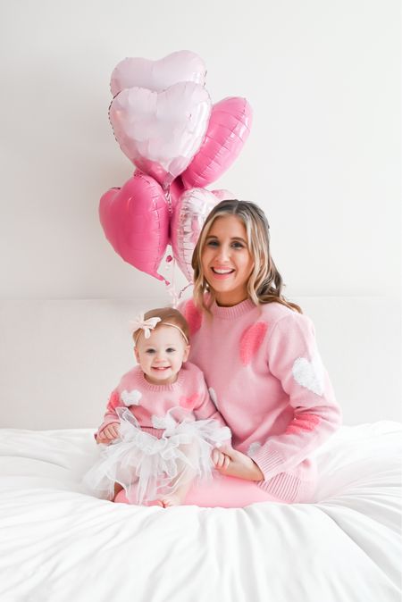 Valentine’s Day, mommy and me, twinning, galentine, Valentine’s Day outfit, Valentine’s Day photos 

Our sweaters are from Bailey’s Blossoms, I linked some similar ones! 

#valentinesday #mommyandme #twinning #valentinesdayoutfit 