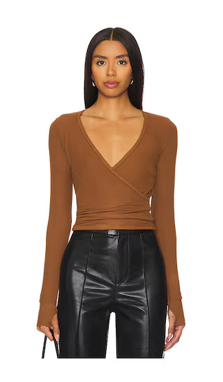 Fairbanks Surplice Deep V Long Sleeve W/ Thumbhole Top in Camel | Revolve Clothing (Global)