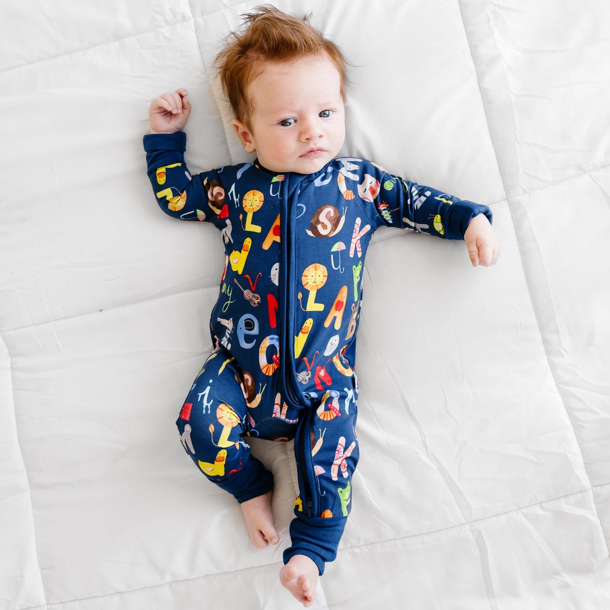 Navy Alphabet Friends Bamboo Viscose Zippy | Little Sleepies