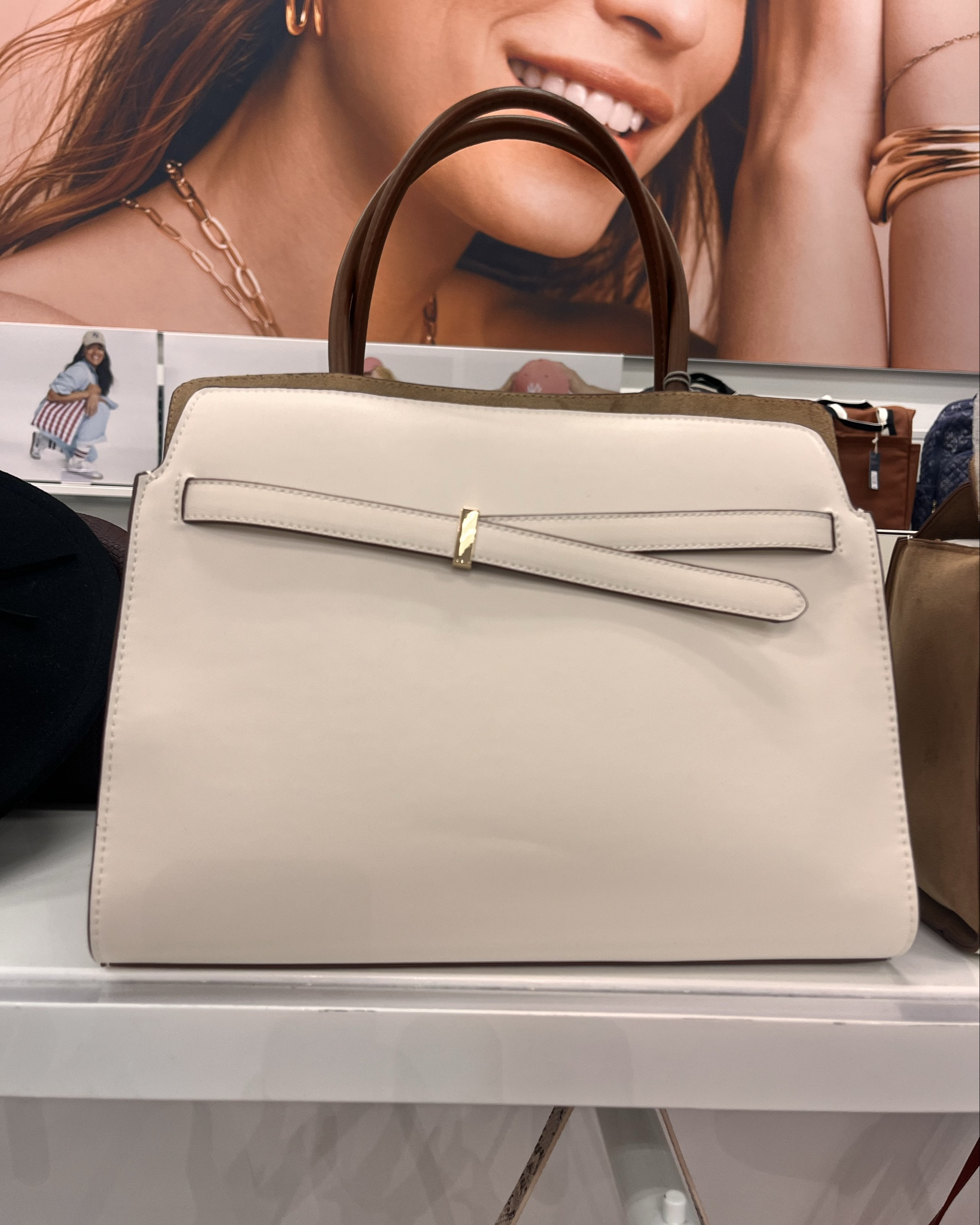 This Belted top handle Satchel is absolutely gorgeous!! The suede side panels are definitely giving boujee on a budget! So Lux! So beautiful!