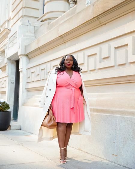 Here’s a spring workwear outfit idea. Try
A belted spring wrap dress with a trench coat. All these pieces come in plus sizes.

#LTKworkwear #LTKmidsize #LTKplussize