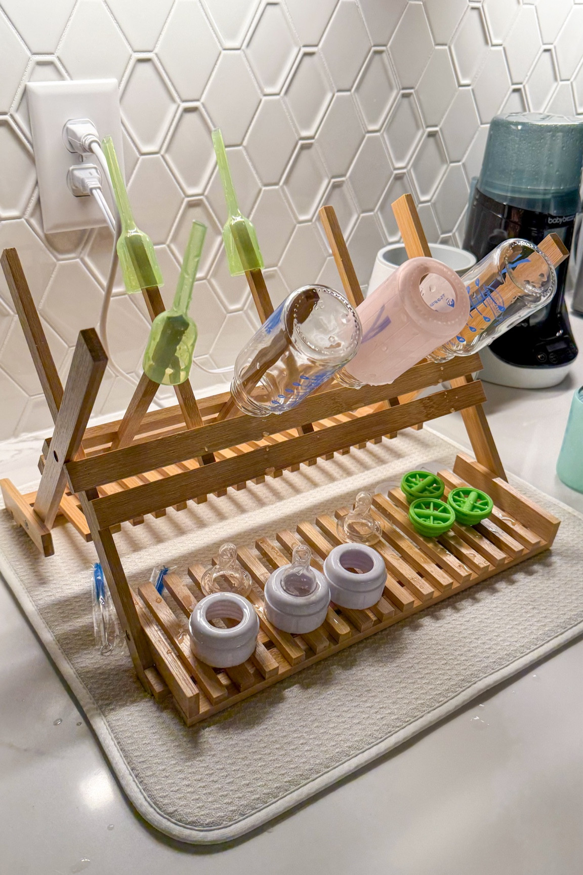 Baby bottle drying rack, Dr. Brown’s glass anti-colic bottles, bottle silicone sleeves to protect the glass bottles! 

#LTKKids #LTKBaby #LTKHome