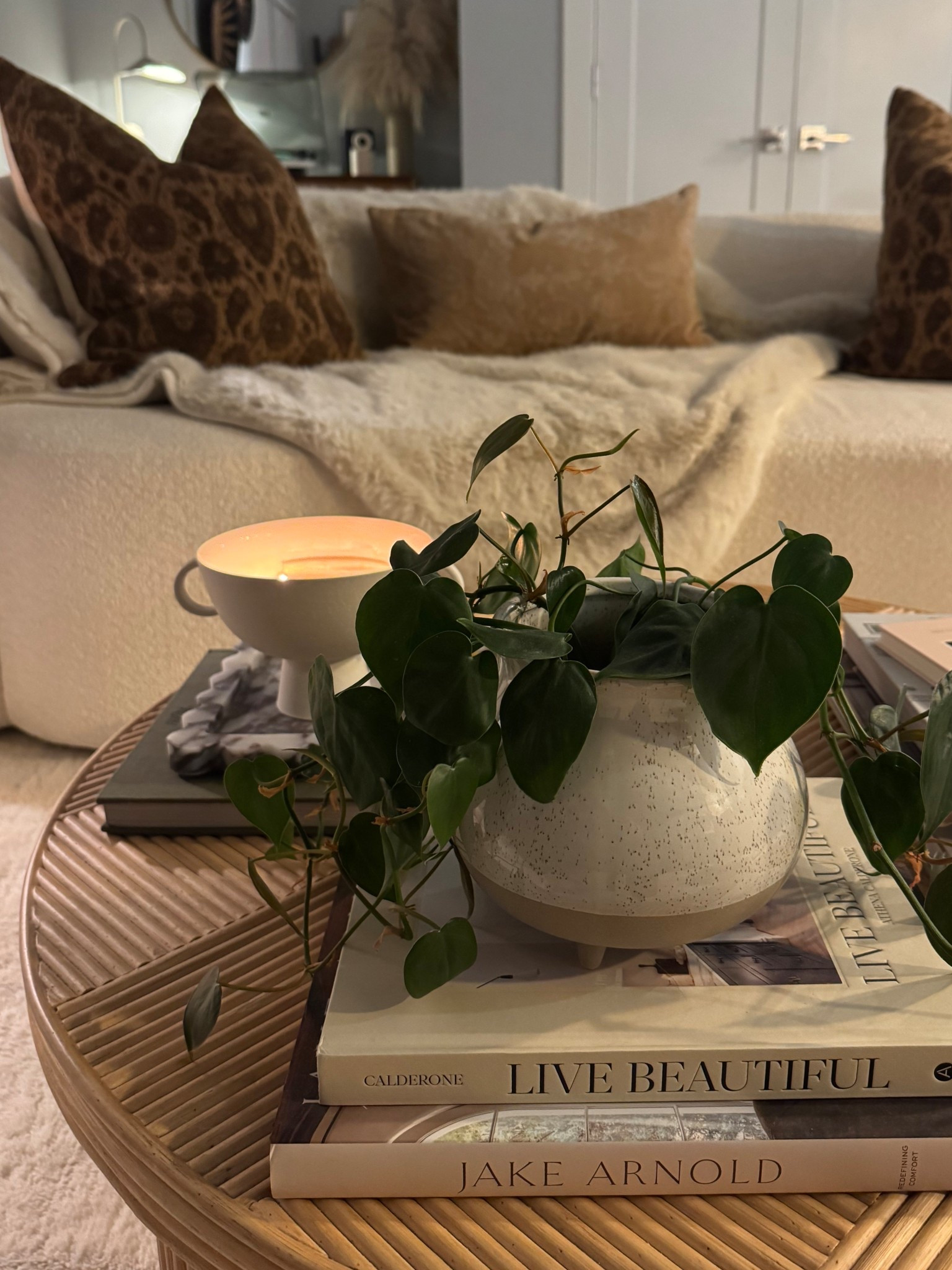 Cozy Corners 🕯️ Warming up our living room with textures & lighting. I wish you could smell this new candle, too. It’s the perfect gift for the home decor lover on your list. Will be sharing my curated gift guides very soon, but if you need some cozy inspo for the holiday season, I hope this brings some comfort. 🤗 #LTKGiftGuide 

#LTKHome #LTKHoliday #LTKdayinmylife