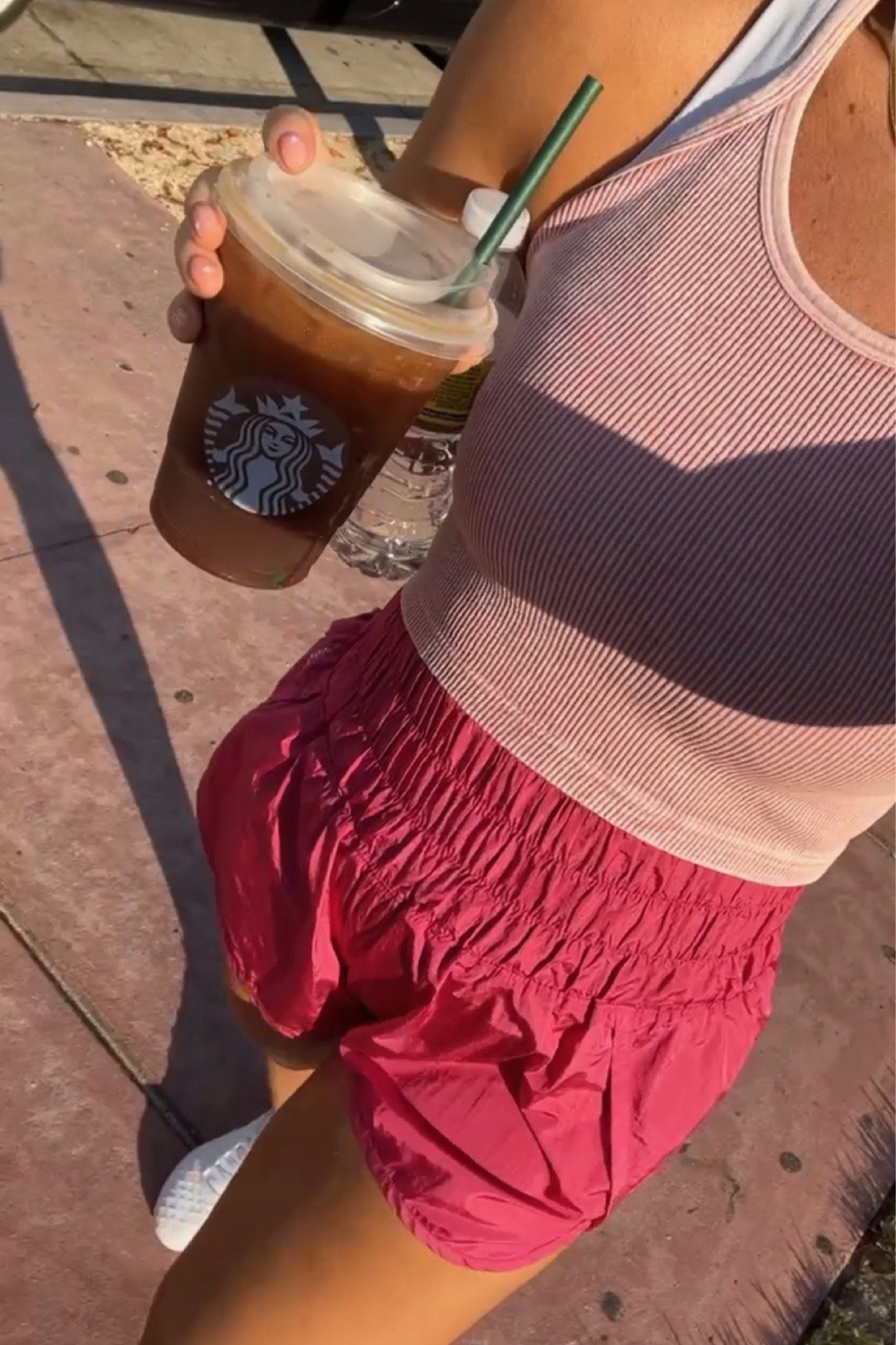 Free People movement, active fit, pink long cropped tank top, pink track shorts 

#LTKunder100 #LTKU #LTKfit