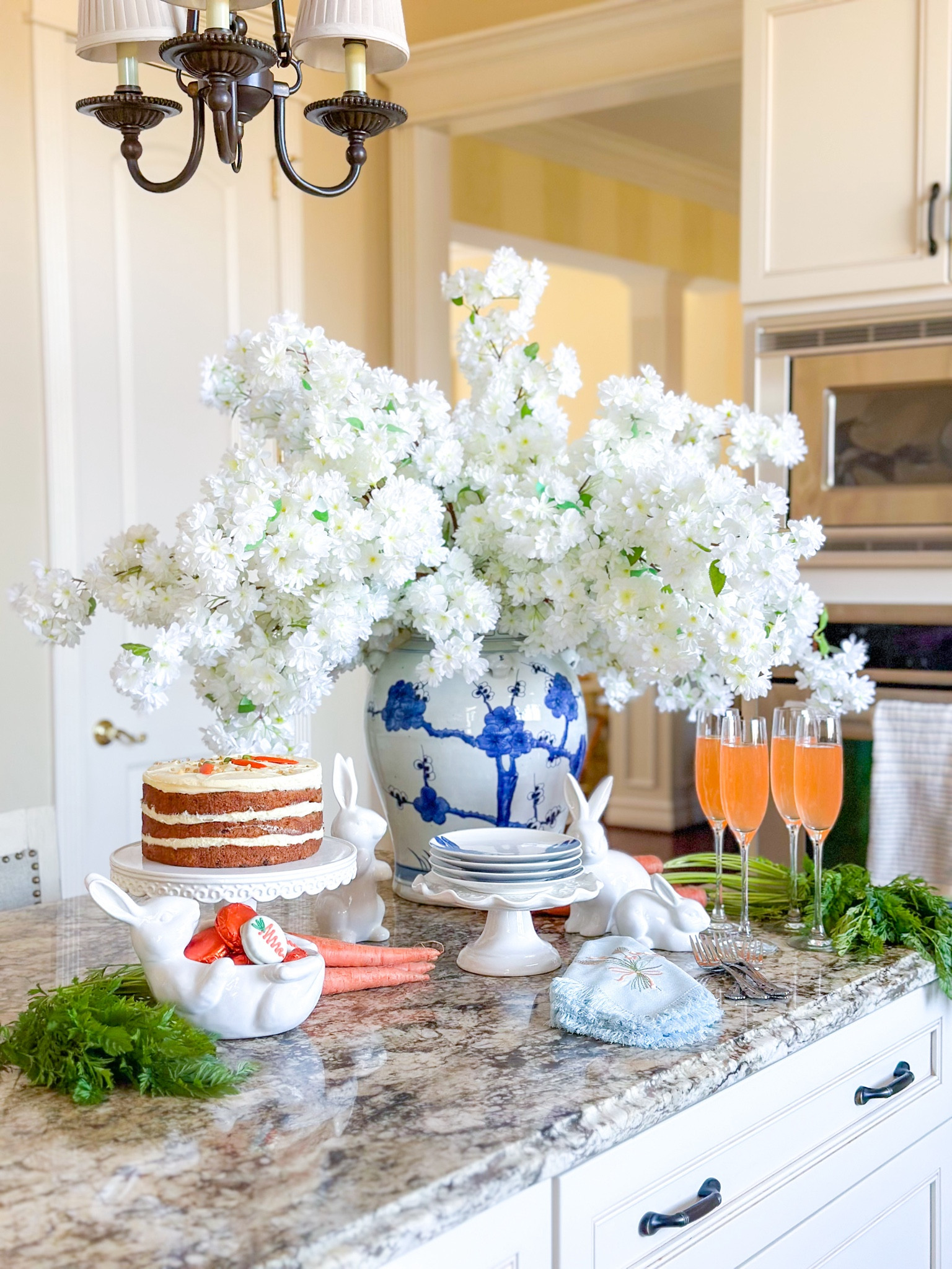 Shop my Bunnies in the Garden spring entertaining look, featuring Blue Bunnies canapé plates from Caskata which are 25% off right now!
#ad

Easter decor, Easter brunch, Easter entertaining, entertaining at home, mimosa bar, carrot decor, cherry blossoms, ginger jar, blue and white decor, bunny decor, bunny candy bowl, white bunny, cake stand, champagne flutes 

#LTKsalealert #LTKSeasonal #LTKhome