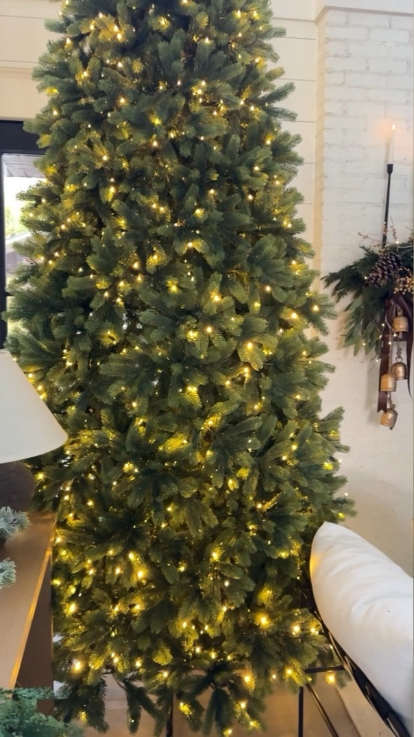 My living room tree is up and she’s a beauty!  This is the 12’ foot King of Christmas Royal Fir Slim!  It’s filled with 1500 lights that can change from warm white or colorful with the remote! ☺️  It is most definitely the fullest tree I have ever owned with its dense, real touch stems!  It’s currently on sale and includes free shipping! 🙌

#LTKstyletip #LTKHoliday #LTKhome