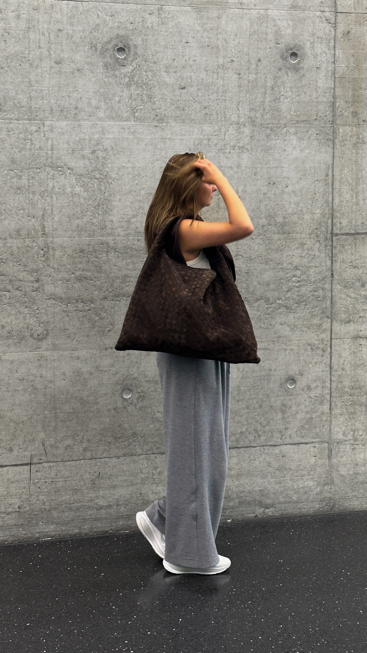 Comfortable travel outfit for visiting Switzerland. Using my large Bottega Hop bag in suede colour fondant, teamed with super-comfortable grey wide-leg trousers from Fabrique and Nike Vomero trainers (the comfiest I have ever found!) Perfect for exploring a new city.  

 

#LTKSeasonal #LTKTravel #LTKItBag