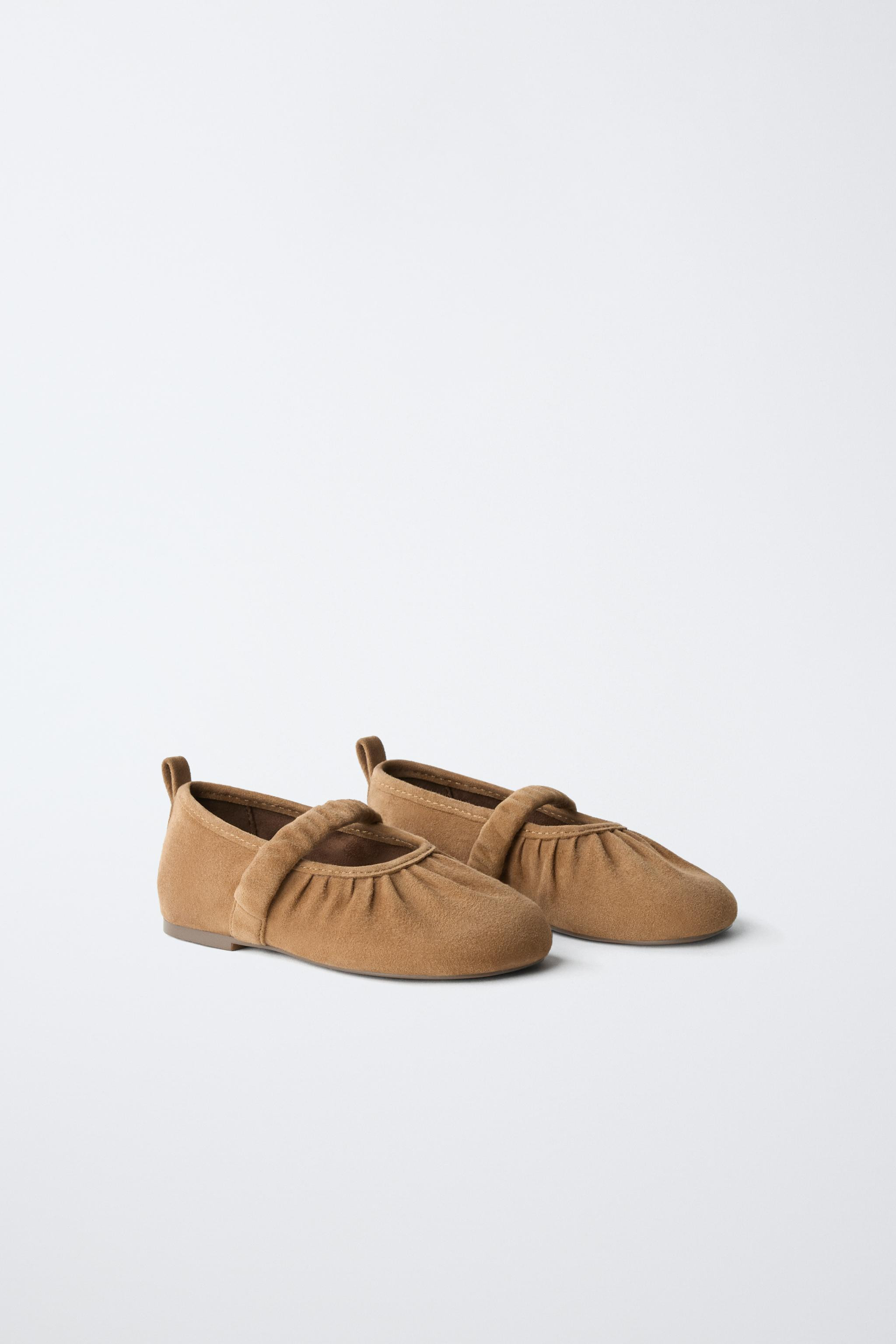 100% leather ballet flats with a suede finish. Features a strap across the instep for added suppo... | Zara US