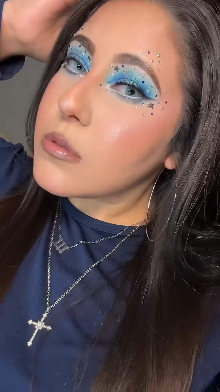 Midnight mermaid energy meets cosmic glam✨💙

This look is what happens when I let creativity completely take over... shimmering sapphire blues, celestial sparkle, glossy skin, and a little constellation moment around the eyes

⭐️ Every detail was placed with
intention to make the eyes look like their own galaxy.
Whimsical, bold, a little ethereal... but still soft, sultry, and luxe. Exactly the kind of makeup that reminds me why! fell in love with artistry in the first place.

Using some of my favorite products to create this dreamy blue fantasy and I’m honestly obsessed with how it turned out. Would you wear this celestial glam?💫

Product details: ⬇️ 
@Juvia’s Place - Wahala Eyeshadow
Palette

@Glamlite - Mikayla Eyeshadow Palette

Huda Beauty - Quick ‘N Easy Precision
Liquid Liner (Extreme Black)

@LA COLORS Cosmetics - Tattoo
Stamp Pen (Star)

@Beauty Creations Cosmetics - Betty
Boop Vibrant Gel Liner (Water)

Grande Cosmetics - Wrap Tubing
Mascara with ProVitamin B5

@velourbeauty - Self-Adhesive Lashes

#creativemakeup #makeuptutorial #eyeshadowtutorial #beautyinfluencer #makeup