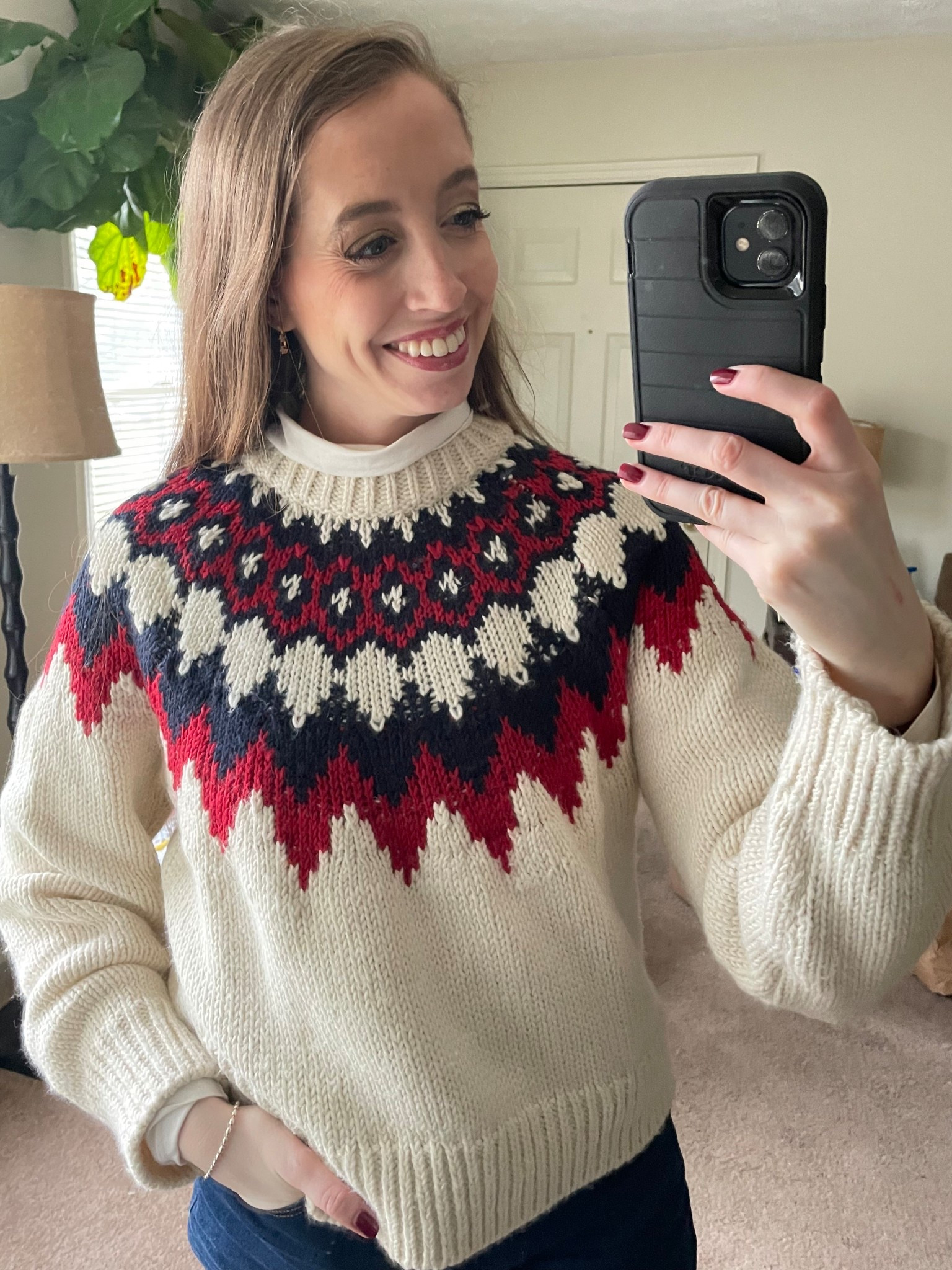 Festive fair isle sweater! This one is TTS with a relaxed fit, wearing the small. Also linking my favorite layering turtleneck tee shirt, also in the small

#LTKFindsUnder50 #LTKHoliday #LTKFindsUnder100