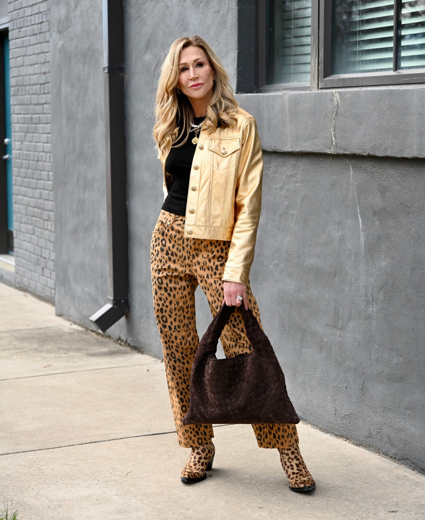 I’m styling my leopard pants for a show stopping look!✨
Leopard jeans, gold jacket, brown suede bag, black crewneck tee (cropped) and leopard western style booties!


#LTKootd #LTKOver40 #LTKdayinmylife