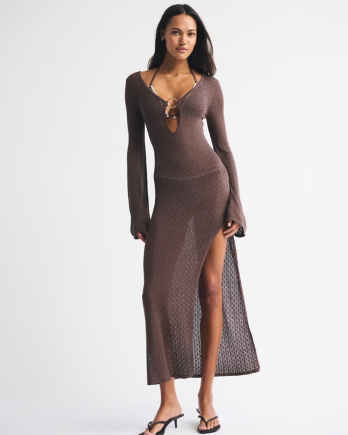 Beach day essential 🤍 The Abercrombie Crochet-Style Plunge Maxi Dress Coverup is such a chic, elevated layer. I love the flattering maxi silhouette, deep-V plunge neckline with O-ring detail, and the open crochet stitching throughout. Perfect for throwing on over a swimsuit and heading from the pool to lunch ✨ 

 #LTKFestival #LTKgrwm #LTKSwim