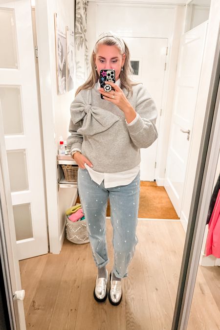 Ootd - Saturday. Grey sweatshirt with giant bow over a white, stretch cotton button down shirt paired with pearl beaded jeans and silver loafers. 



#LTKstyletip #LTKover40 #LTKeurope