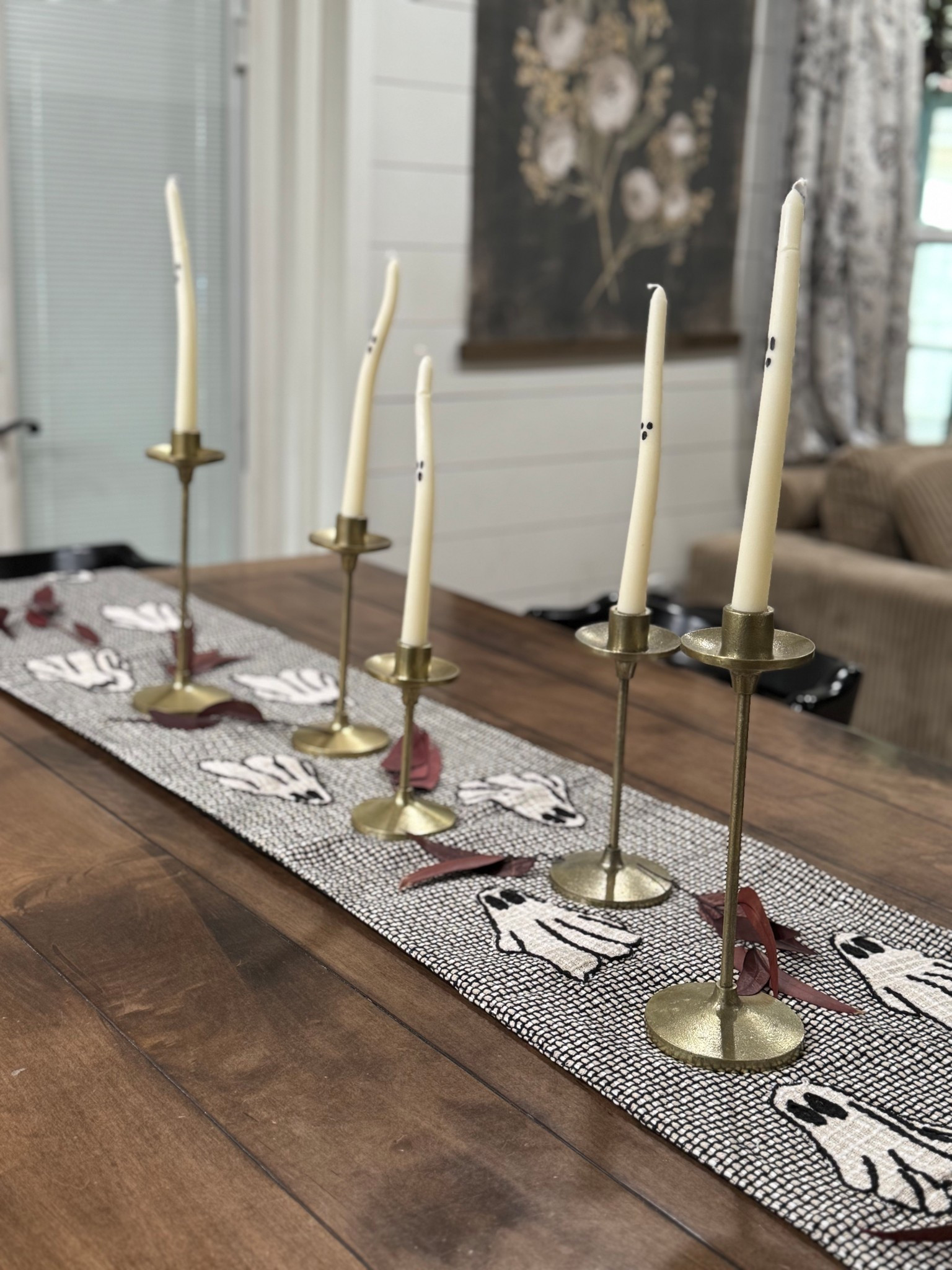 Halloween table, Halloween decor, Halloween candles, ghost candles, ghost table runner, gold candle holders, Halloween target decor, Halloween Amazon decor, Halloween dining room 

#LTKHalloween #LTKHome #LTKSeasonal