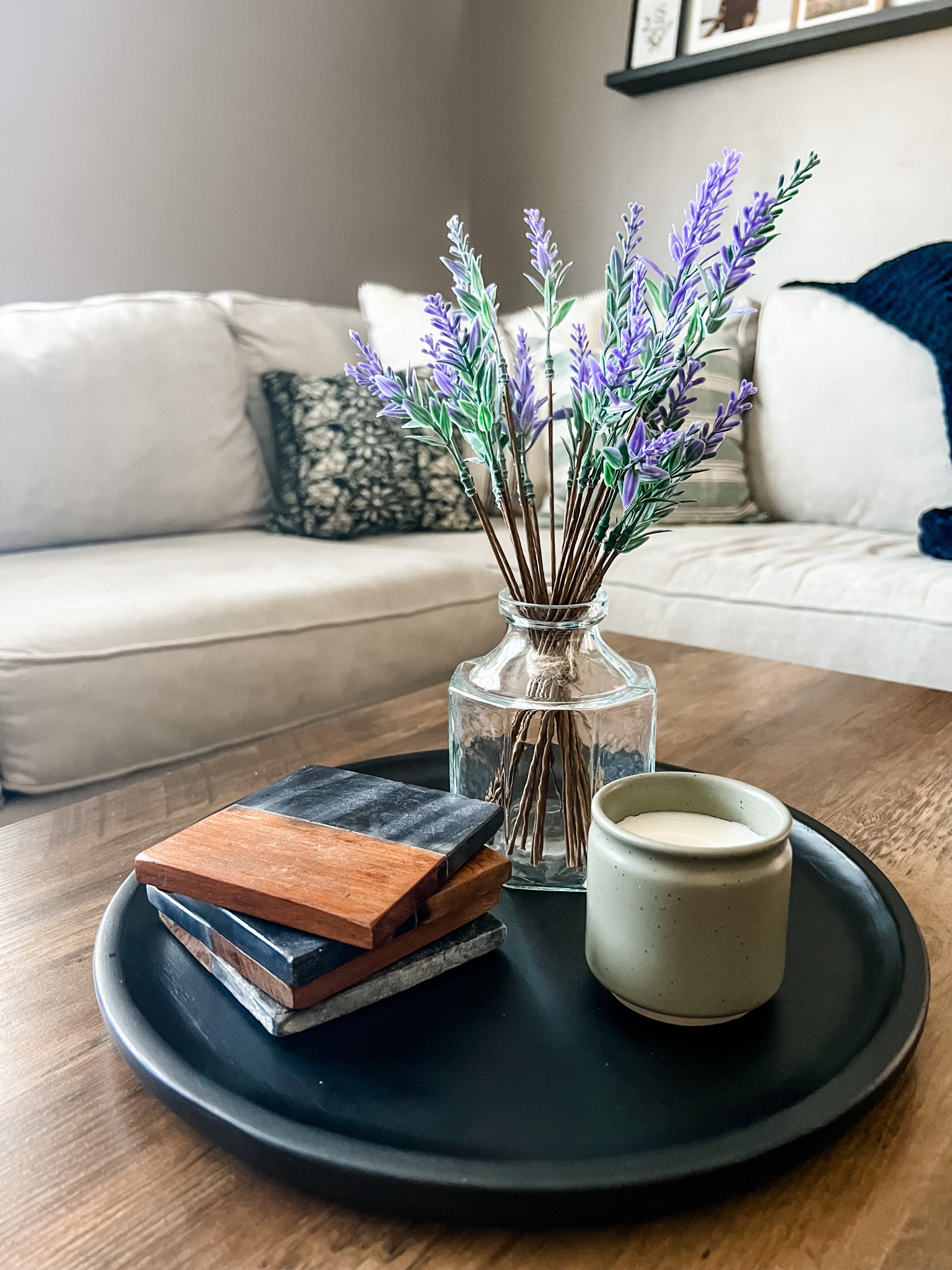 Early spring coffee table decor 

Faux lavender, faux plant, faux stem, spring candle, couch pillows, coffee table, wood marble coasters 

#target #wayfair #springdecorating

#LTKSeasonal #LTKFind #LTKSale