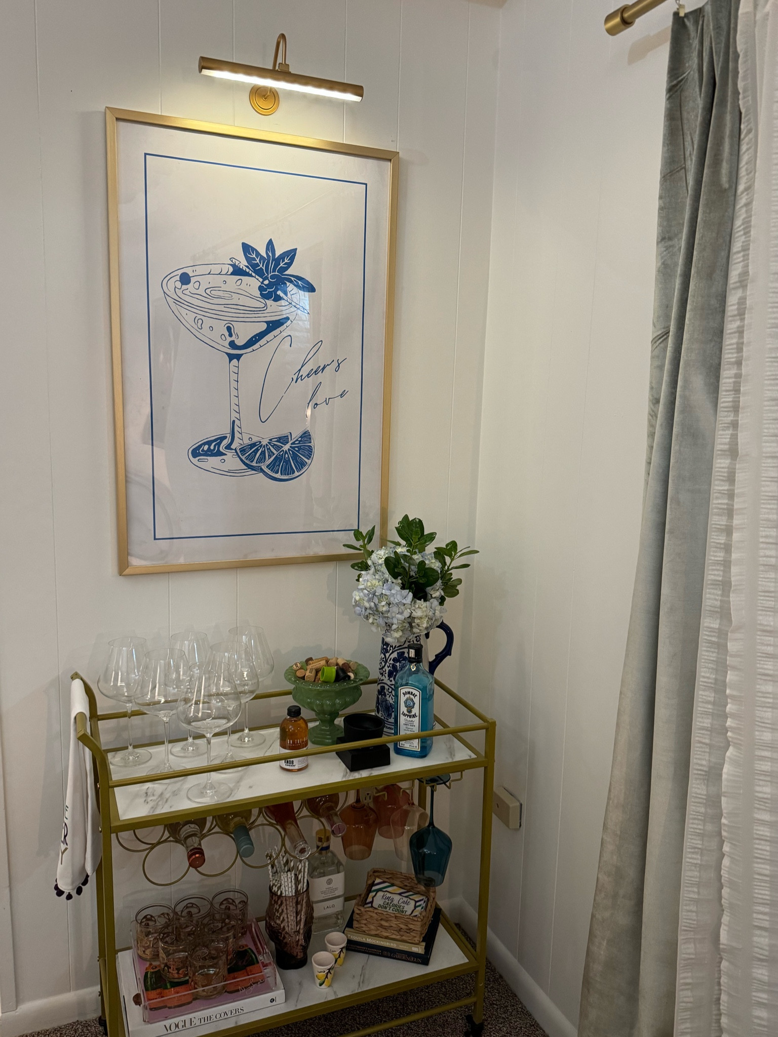 I’m completely obsessed with my bar cart corner! I added this picture light from Amazon and it was a total game changer for the space. My print is one of my favorite finds for our new home ✨

#LTKfindsunder100 #LTKstyletip