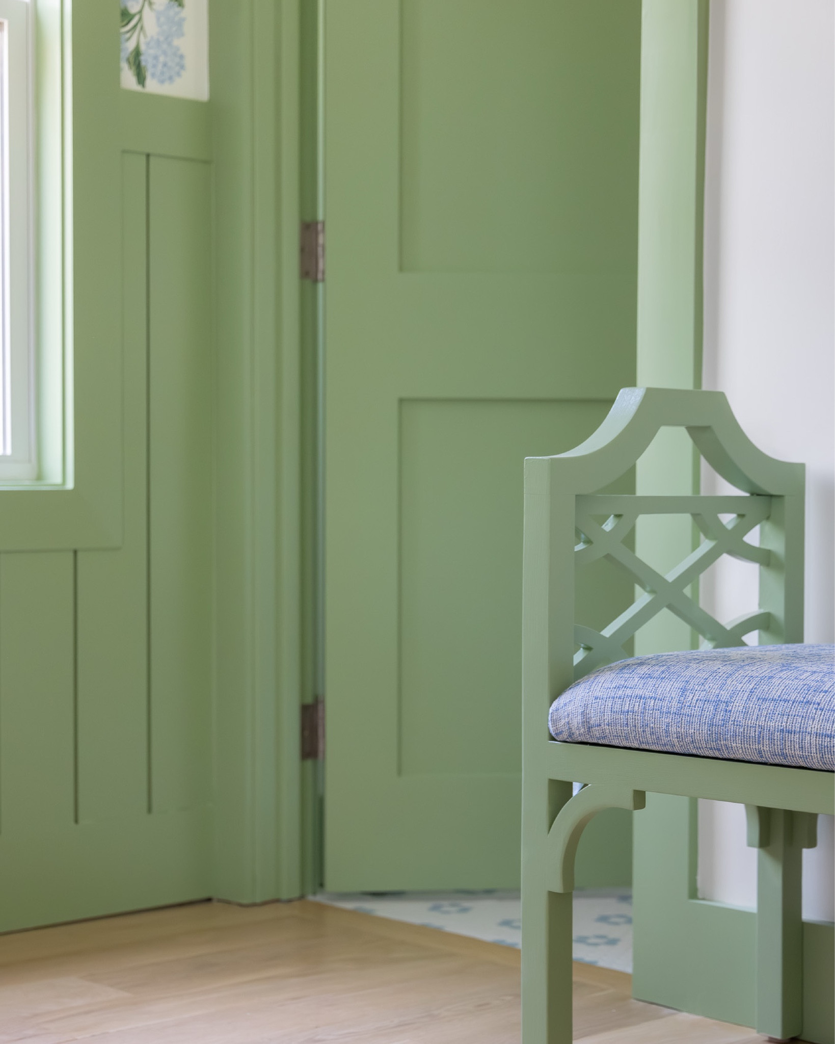while we love a classic blue and white color scheme, one of our favorite tricks is to introduce a third color to keep things from feeling too on the nose. inspired by a beautiful hydrangea print wallpaper from @riflepaperco, we created a custom shade of green paint to use for the trim, doors, and even some of the furniture in the primary bedroom at the #preppyhollowhouse. wide plank white oak hardwood floors and woven wood window shades add natural texture to the space. #dwelloctoberstay #dwelloctober

#LTKHome