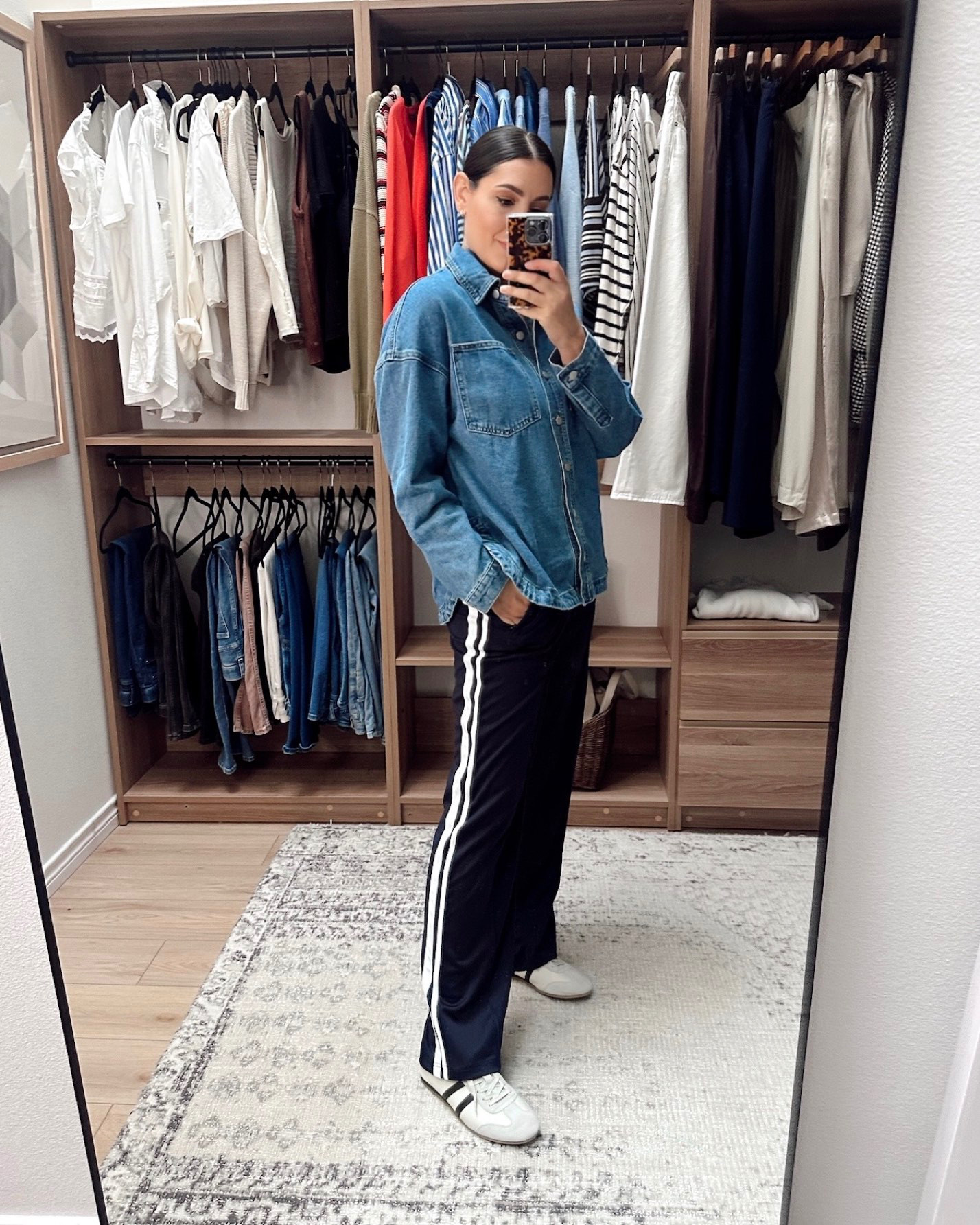 I‘ve been looking for a track pant for a while and FINALLY found one that I love. This is a thicker track pant fabric – like the Adidas ones. It has a pleated steam in the front. I got the 32" inseam and it’s the perfect length for me at 5'9". I am in the large, 32" inseam. The waist is a touch more fitted, there is a drawstring but it’s more to tighten than to loosen. Go up a size if you have a rounder  waist. 
Also love loved this oversized chambray top. I thought it would be more like a shacket fabric but it’s more of a top! I’m thrilled because I’ve been wanting a very oversized denim shirt. This is the large and it’s a true to size oversized fit. It’s a sturdier denim feel, but still top like.  Super cute find! 

 
