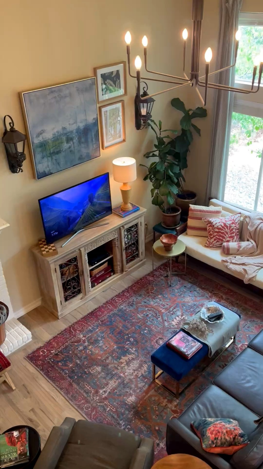 A large wall styling solution without breaking the bank! I used 2 oversized sconces(can be indoor or outdoor,) , a large abstract painting and 2 smaller pieces of art to create a grouping. This grounded the space and creates something unique and beautiful! You don't need expensive built-ins to create a cohesive welcoming look for a tall and large wall👍 I've linked some key pieces for you!

#LTKdayinmylife #LTKSeasonal #LTKHome