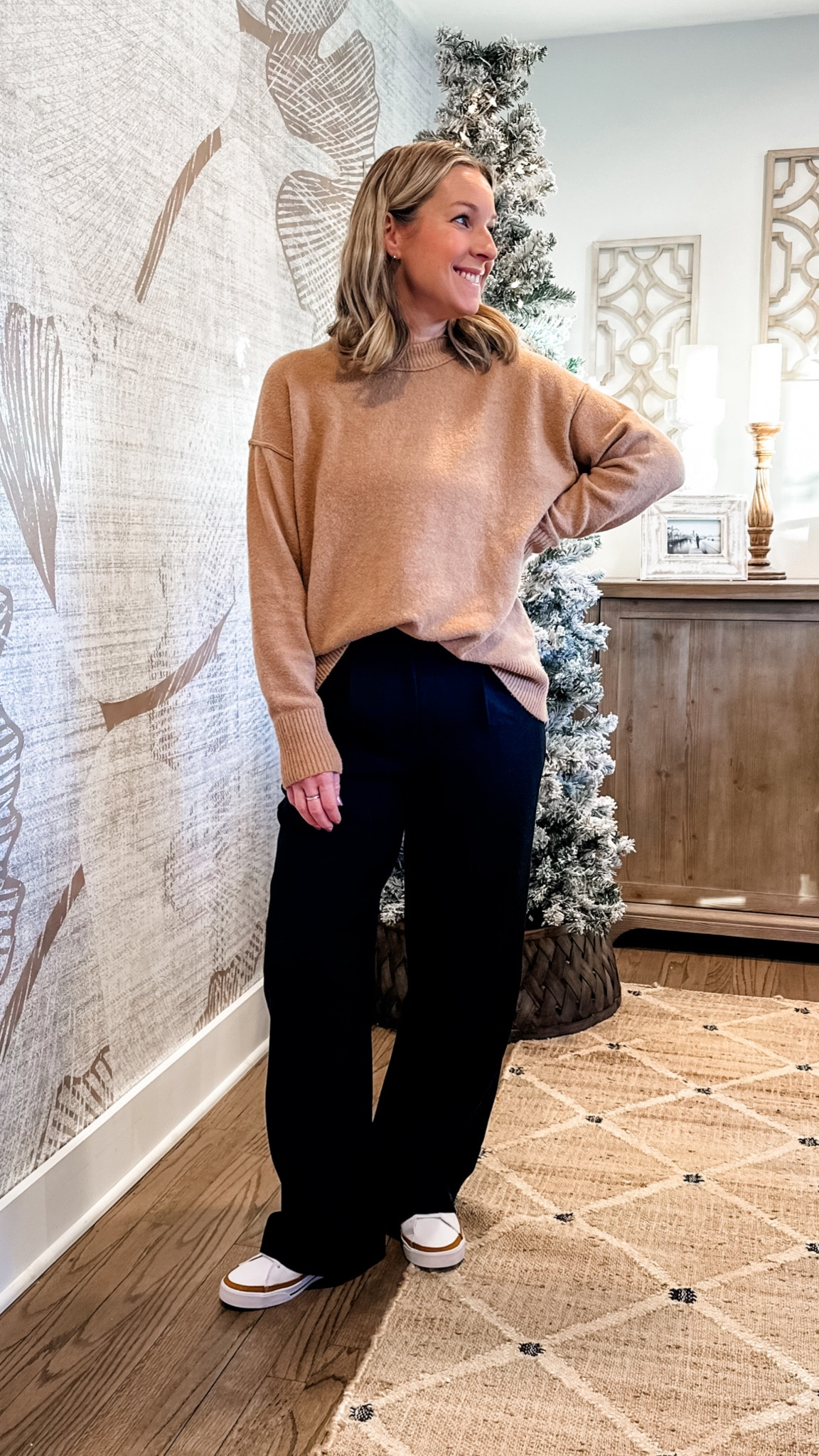 OOTD. These trousers are INCREDIBLE and run tts. I’m in a medium. Inseam is perfect. I’m 5’3. They have pleats and pockets. This sweater is the softest and coziest and is always on sale. Runs big, I’m in an XS. The sweater link has the stripes. Both come in so many color options  

#LTKmidsize #LTKsalealert #LTKstyletip
