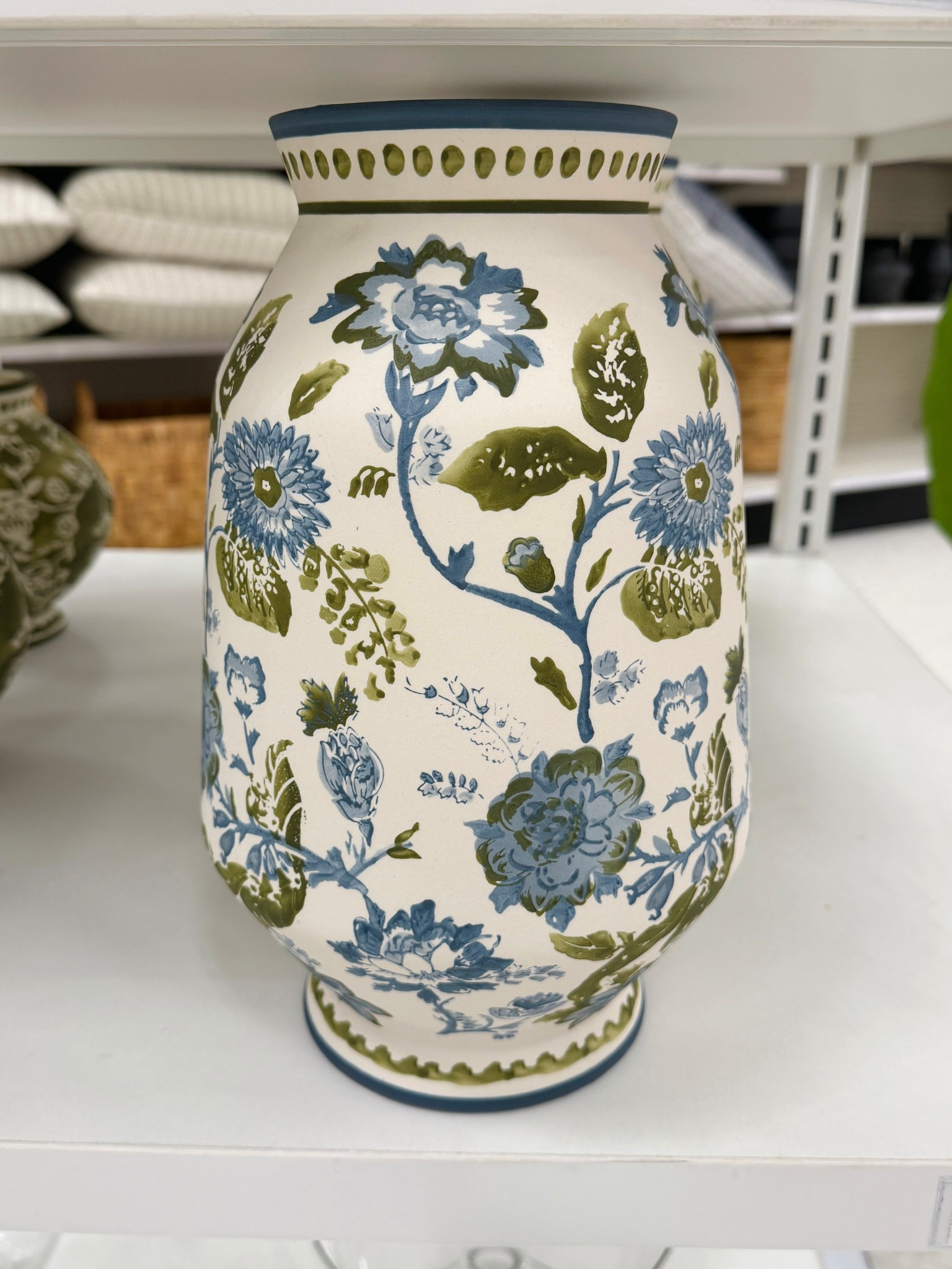 New at Target! 💙 The Tall Floral Painted Ceramic Vase is such a pretty find. 🌿 The blue and green floral pattern on the white ceramic base gives it that elegant, designer-inspired look while still feeling fresh and classic. 🍃 A lovely accent for a console, mantel, sideboard, or shelf—just add fresh stems or style it on its own. 🌻 #TargetFinds #Vase #HomeDecor

#LTKHome #LTKSaleAlert