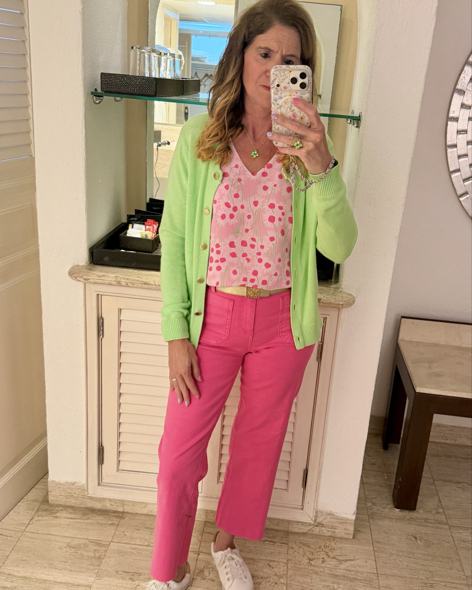 Travel day outfit ✈️ leaving paradise

Wearing some new beautiful spring pieces from Lilly Pulitzer for the trip home. I love how versatile this top is — you can wear it showing the print or flip it for the pink solid side.

It pairs perfectly with mint green shorts, capris, white pants, or a skort, making it a great travel piece.

Also carrying my Lululemon crossbody, which is one of my favorite travel bags because it holds a lot and has two zip pockets to keep everything organized.

Shop this travel outfit in my LTK.

If you are interested in the jewelry, it can be found @thesparkledshell. Use my code:lillylover10. 

travel outfit women
airport outfit women
Lilly Pulitzer outfit
spring resort wear
colorful spring outfit
pink pants outfit
women over 40 style
women over 50 fashion
airport style outfit
travel day outfit
resort wear outfit
lululemon crossbody bag
casual vacation outfit
spring travel style

#ltktravel
#airportstyle
#traveloutfit
#springstyle
#lillypulitzerstyle
#resortwear
#casualtravelstyle
#ltkstyle
#womenover40style
#womenover50style
#traveldayoutfit
#ltkspring

#LTKBeauty #LTKTravel #LTKSeasonal