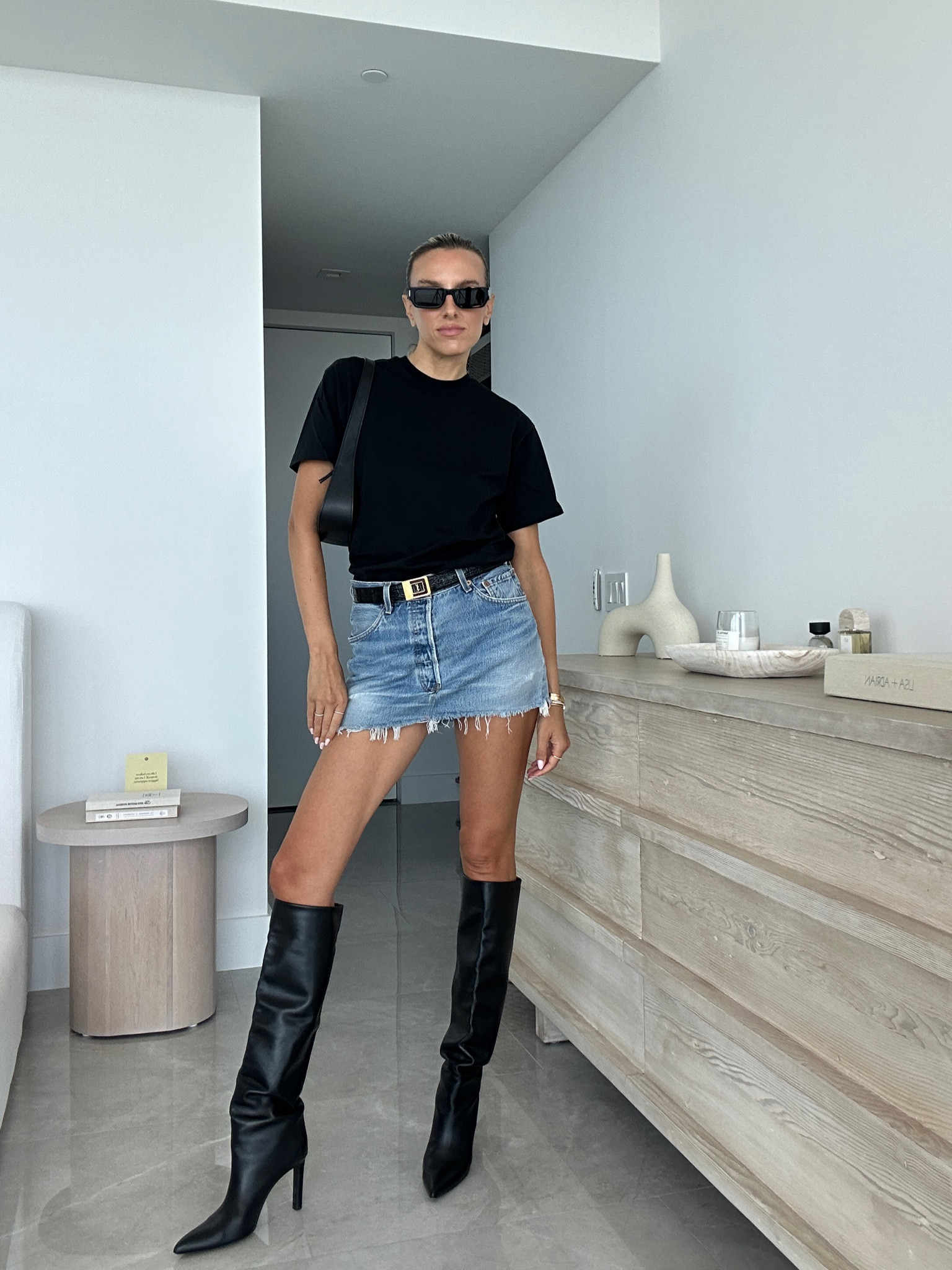 Styling my favorite oversized t-shirt with a denim mini skirt. 

Fall outfit, oversized t-shirt, denim mini skirt, fall outfit