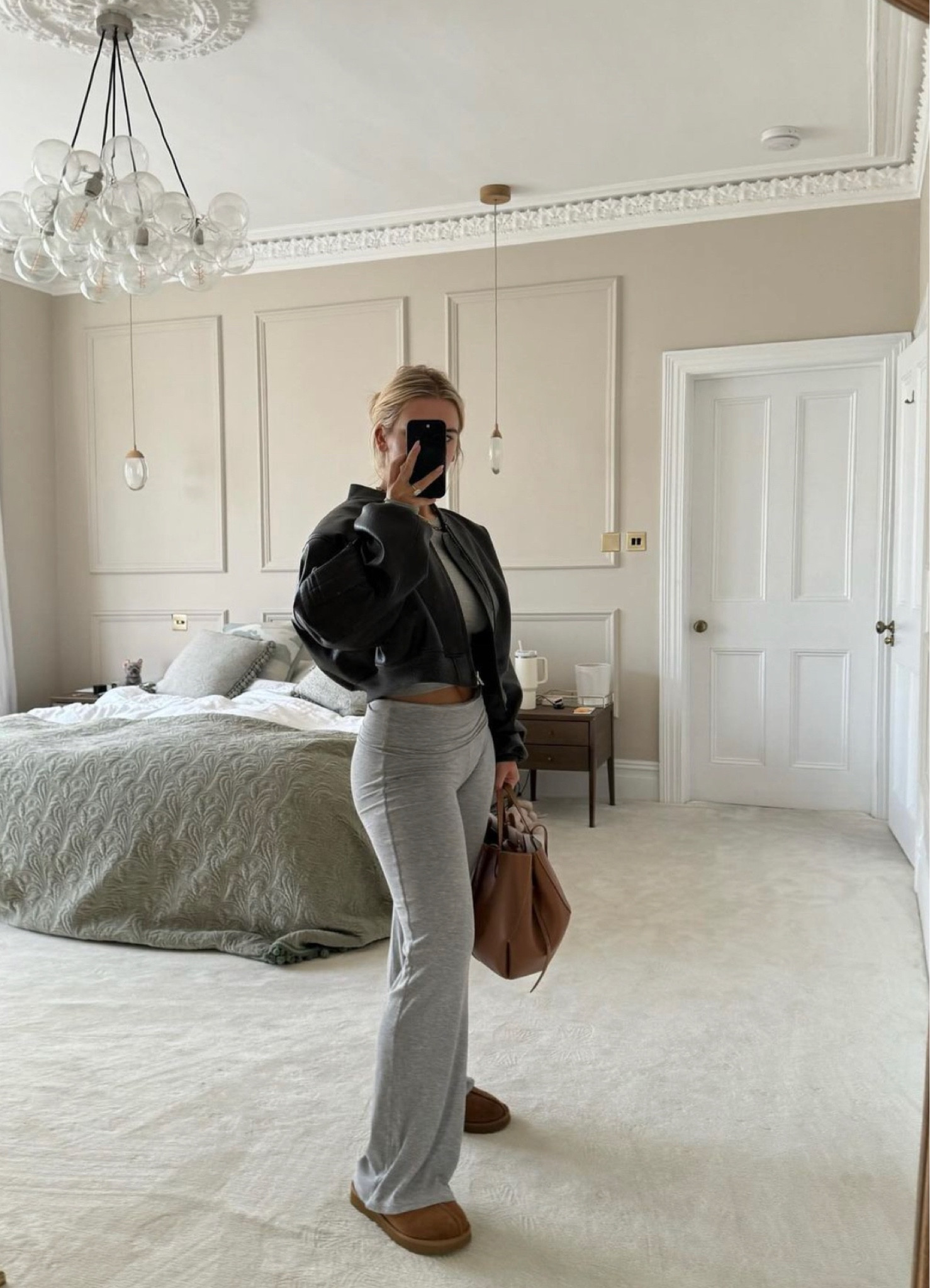 Cropped leather bomber jacket, flare leggings, leather handbag, ugg boots

#LTKstyletip #LTKSeasonal #LTKeurope