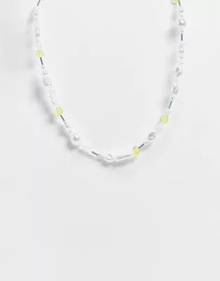 ASOS DESIGN necklace in blue yellow bead design with faux star pearls | ASOS (Global)