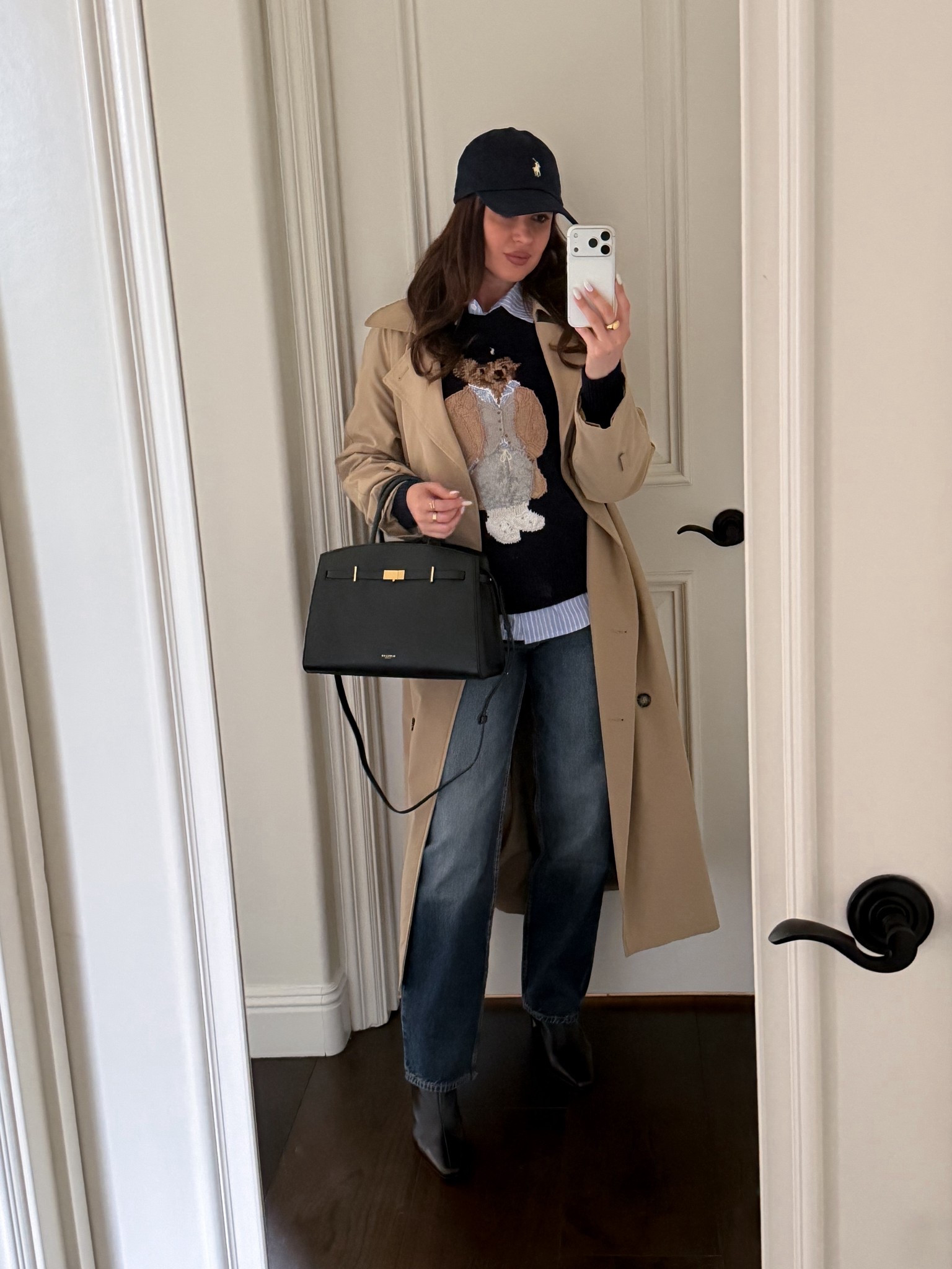 Styling this cute and cosy Ralph Lauren Bear Sweater with straight leg jeans, a trench coat, heeled booties and a classy black DeMellier  tote  #ralphlauren #sweater #cashmere #bearsweater #trenchcoat #coat #cap #booties #tote #black #navyblue #demellier 

#LTKFindsUnder100 #LTKootd #LTKWorkwear