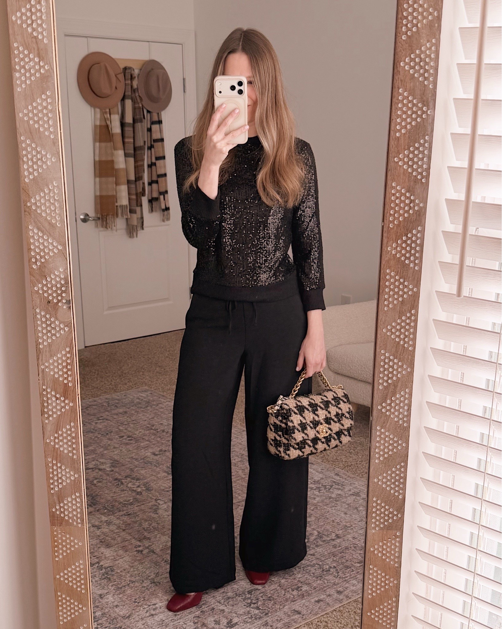 A sequin knit with wide leg pants for an easy holiday outfit.

holiday outfit ideas, sequin sweater outfit, winter style, neutral outfits, casual holiday look, wide leg pants outfit, outfits for women over 40

#LTKOver40 #LTKFindsUnder100