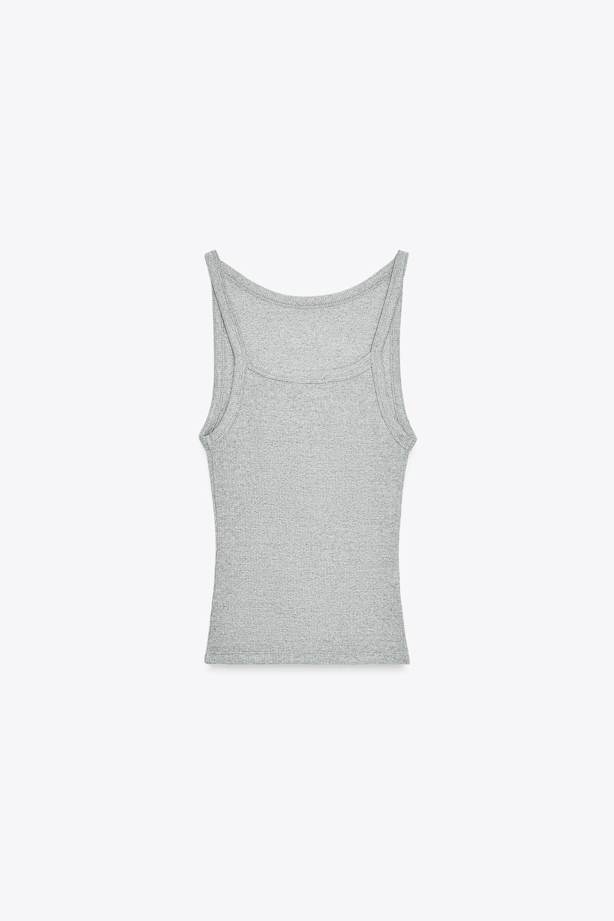 HALTER RIB TOP$ 19.90 White Gray marl BlackGray marl | 1044/626/803Add to cartAddHalter neck slee... | Zara US